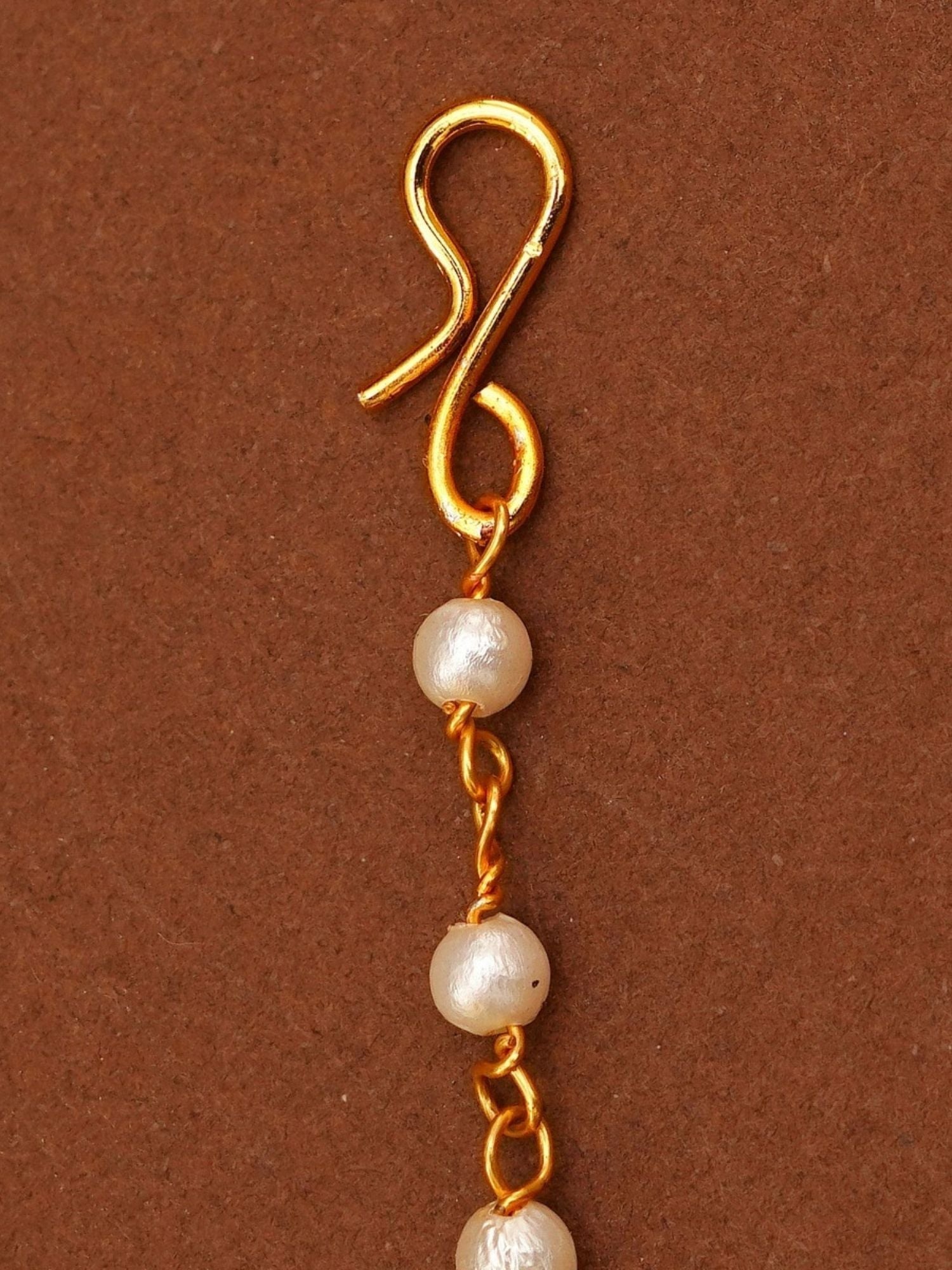 Gold Plated Colourful Paachi Kundan Maangtikka with white pearl beads and intricate gold detailing