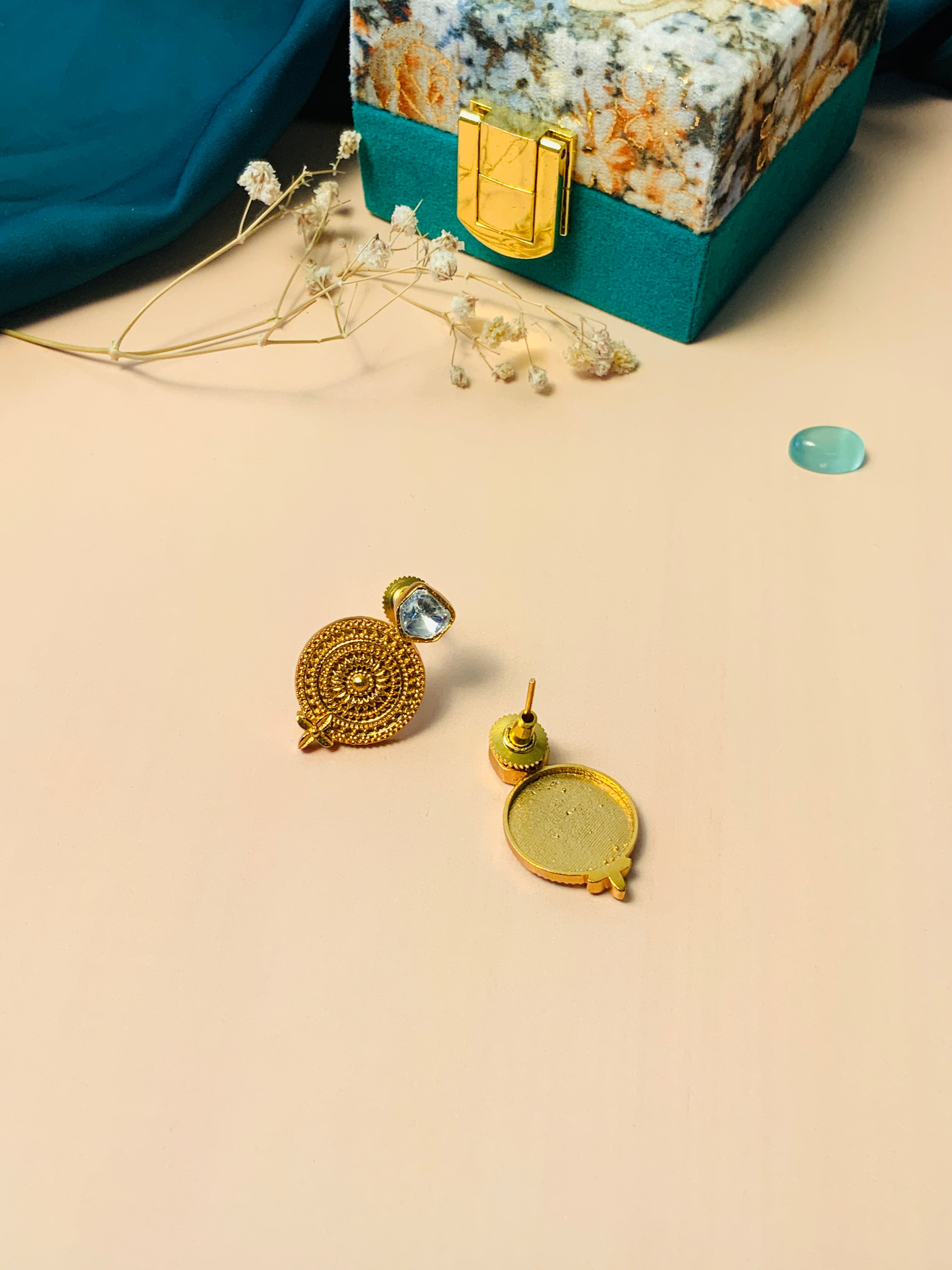 Gold Plated Glass Kundan Polki Stud Earrings with intricate circular design and clear stones