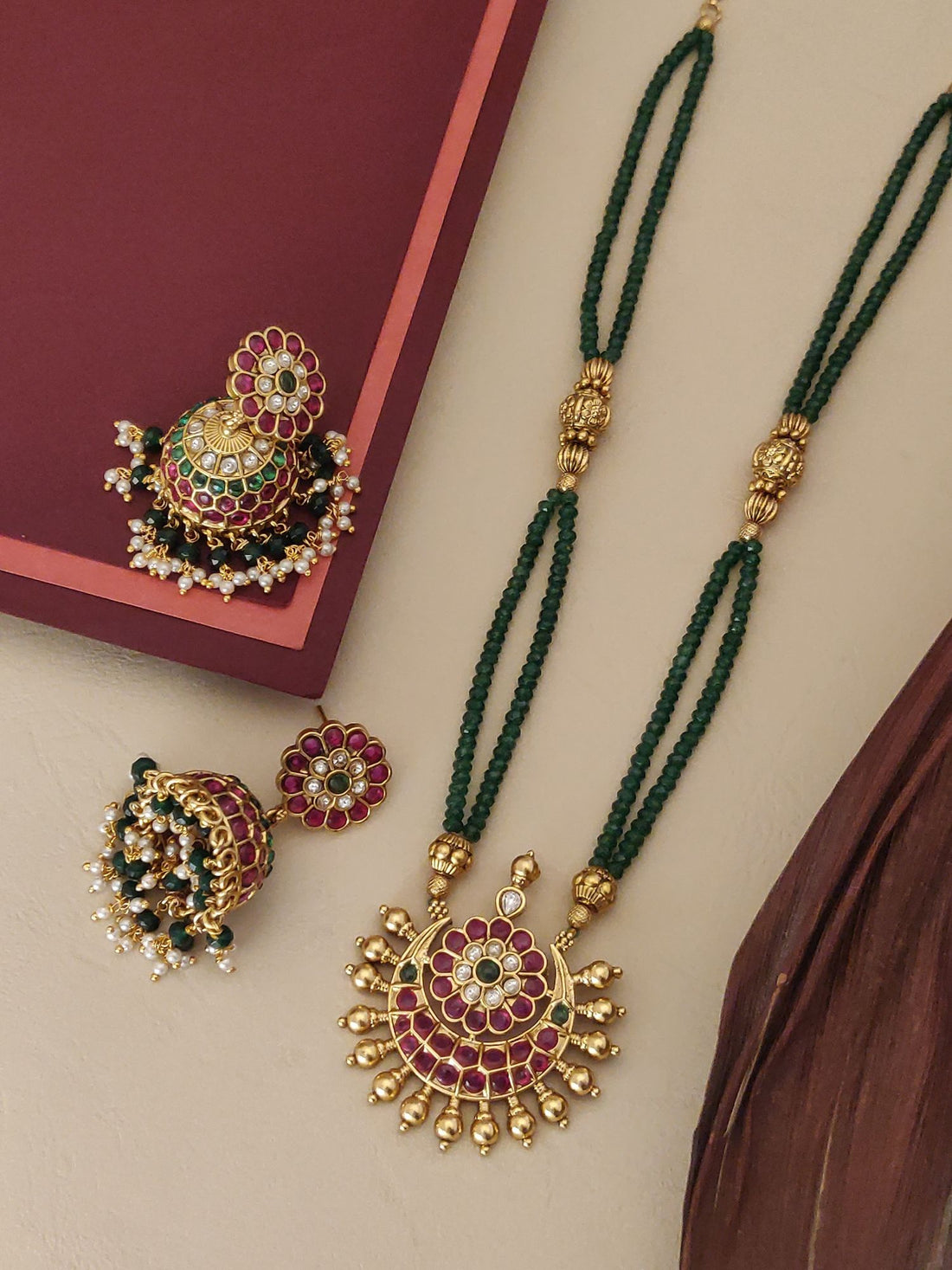 Traditional Gold Plated Kemp Necklace set featuring intricate design with colorful stone embellishments.