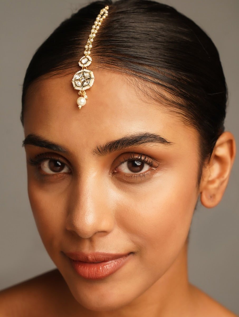 Gold Plated Kundan Maangtikka worn by woman with smooth hair and natural makeup from Abdesignsjewellery