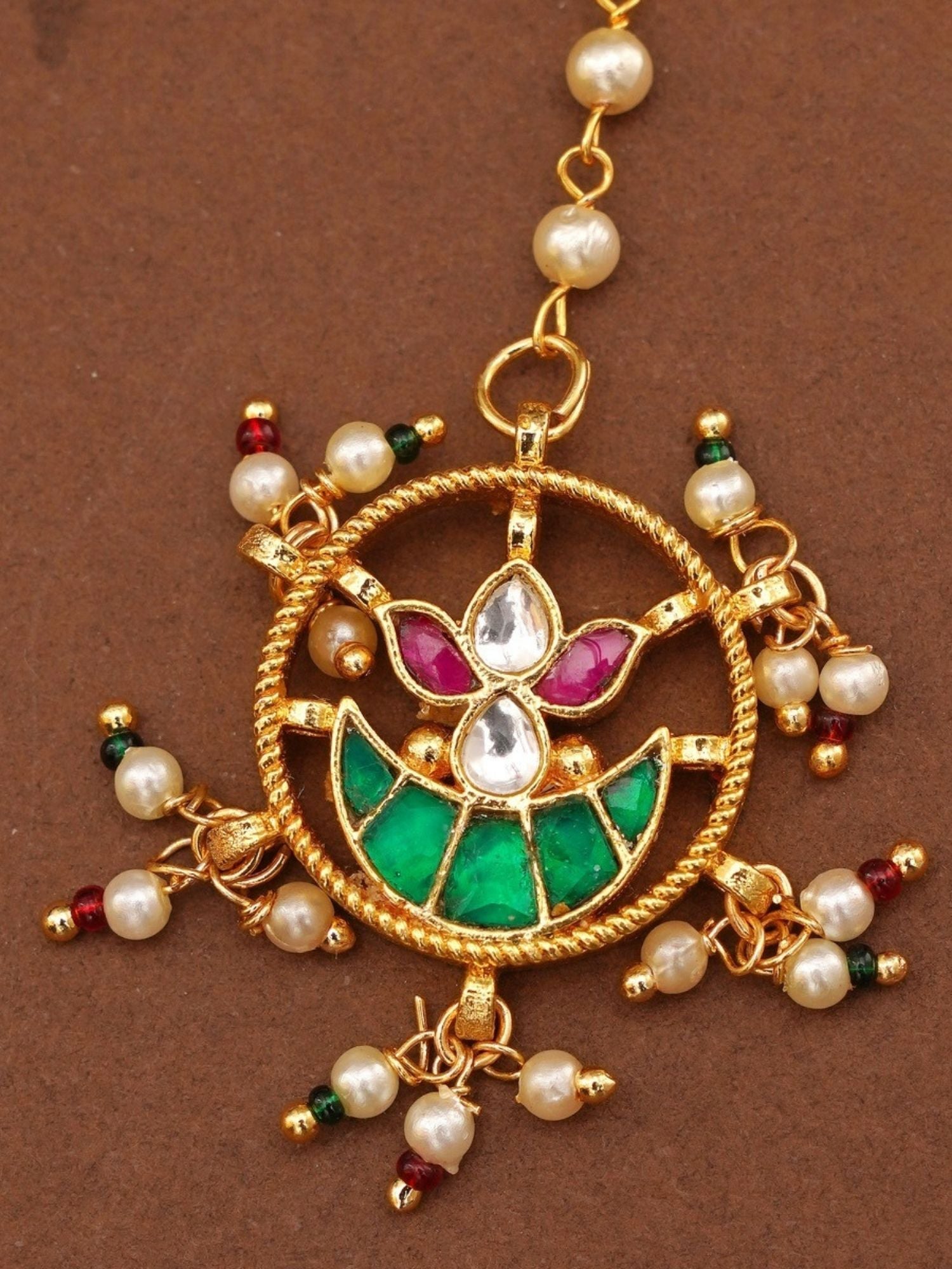 Paachi Kundan Maangtikka with green and pink stones and pearl embellishments by Abdesignsjewellery
