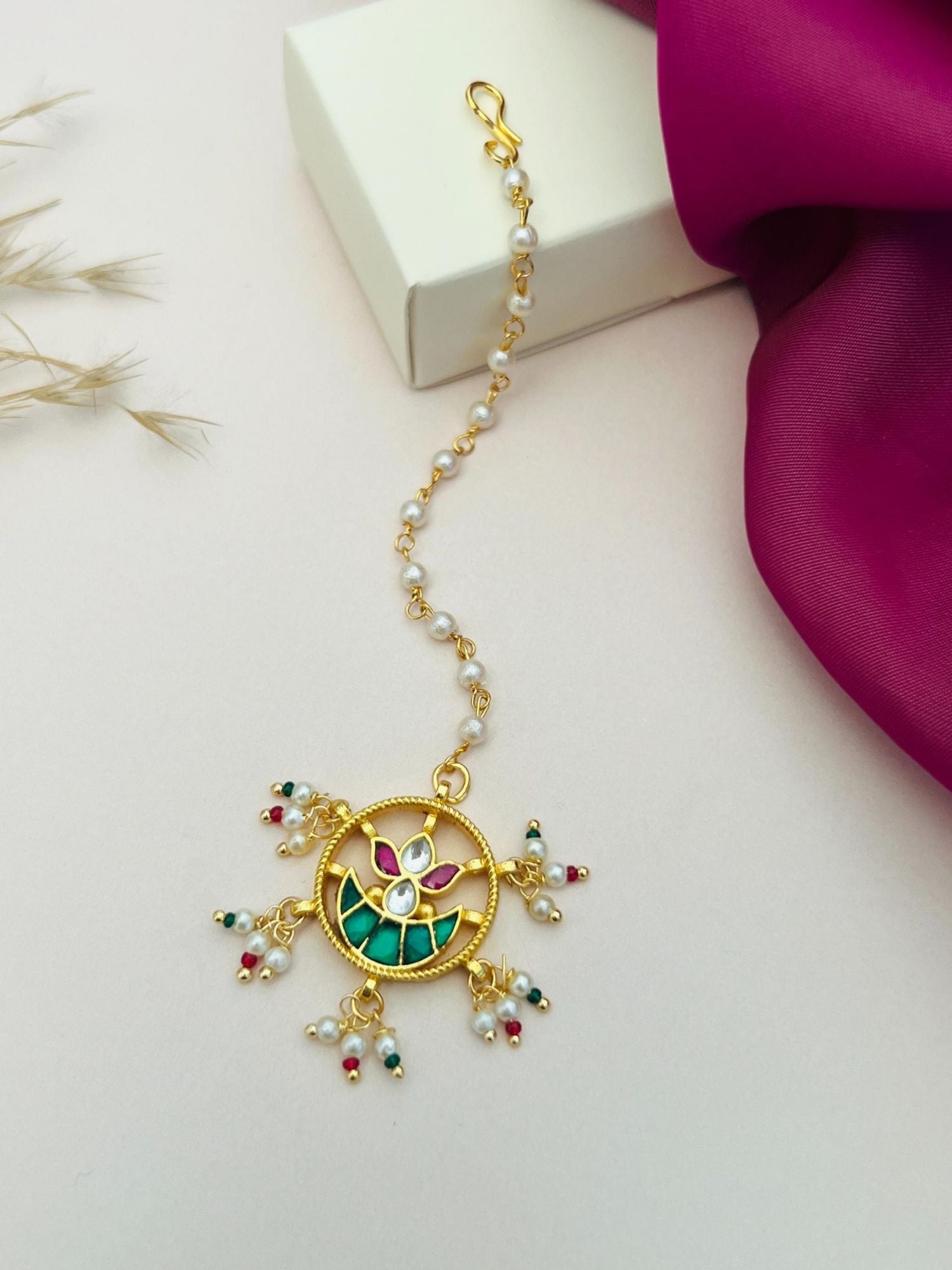 Gold Plated Paachi Kundan Maangtikka featuring intricate green and pink design with pearl accents by Abdesignsjewellery