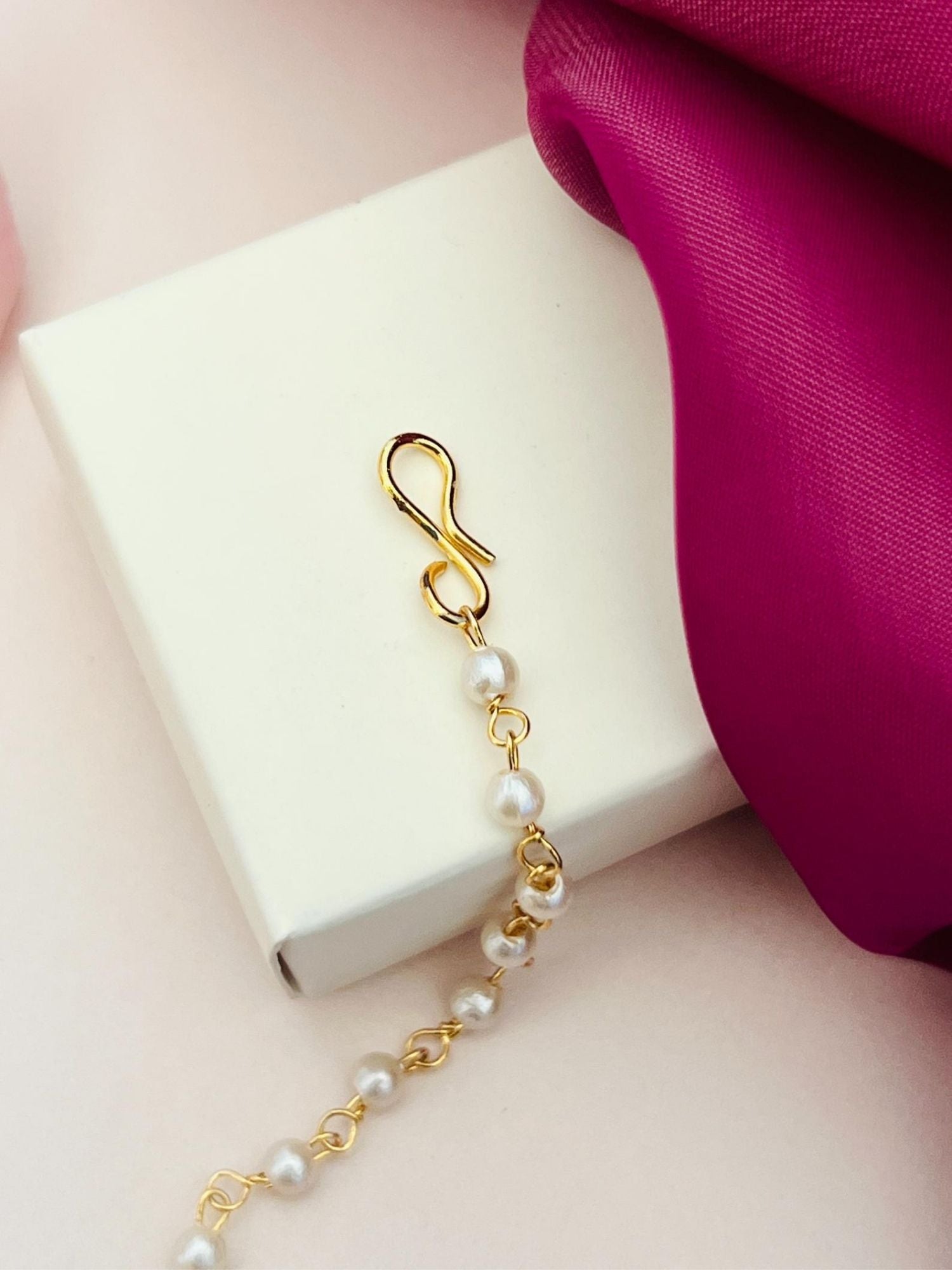 Gold Plated Paachi Kundan Maangtikka with pearl beads and intricate gold hook from Abdesignsjewellery