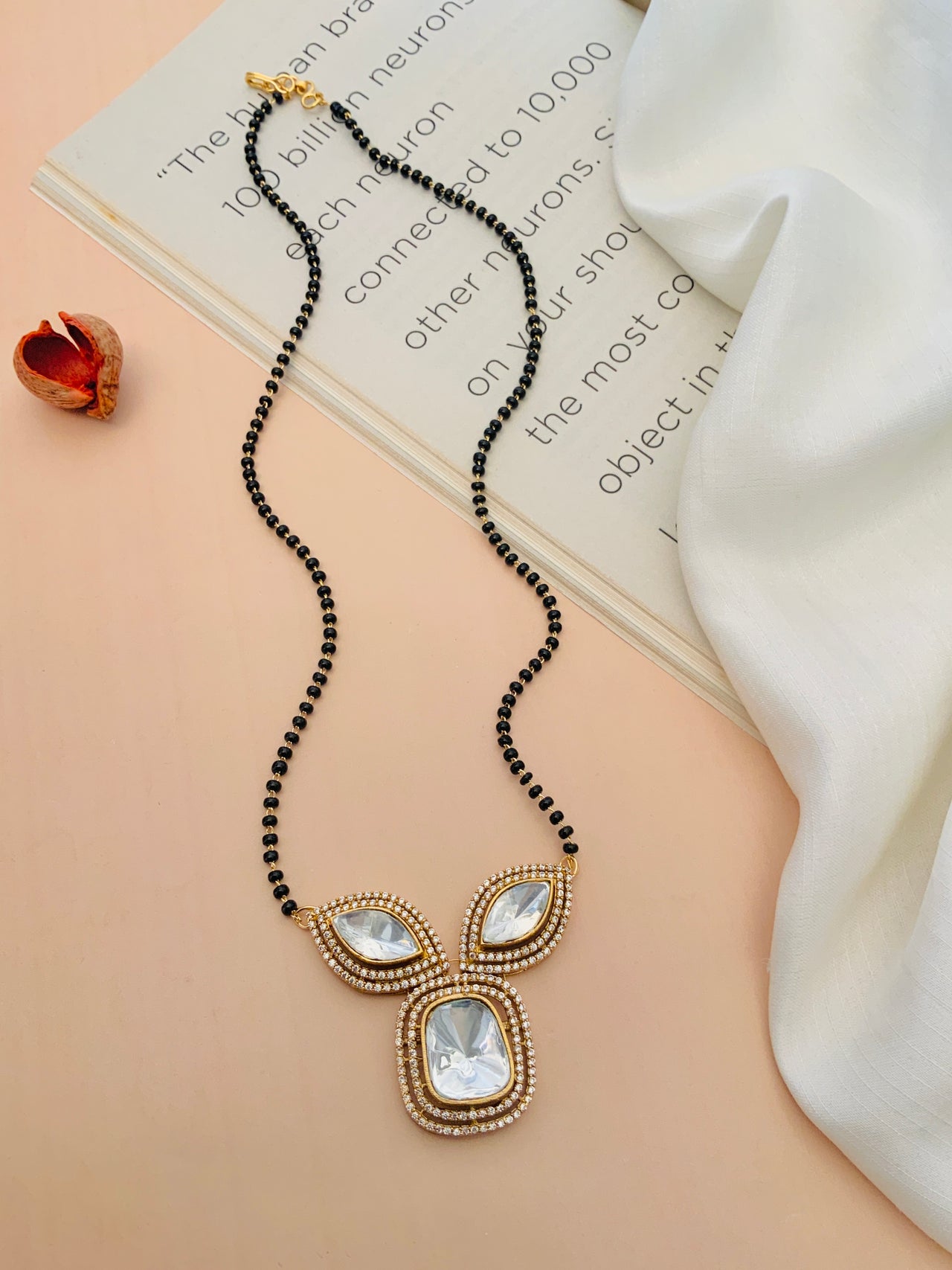 Gold Plated Polki Mangalsutra with black beads and intricate pendant by Abdesignsjewellery