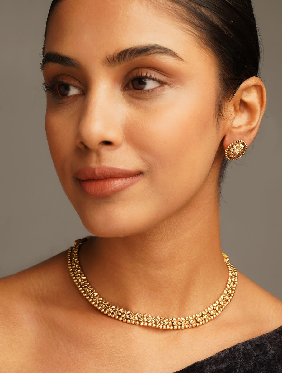 Golden Plated Matt Finish Necklace Set by Abdesignsjewellery worn by woman with matching earrings