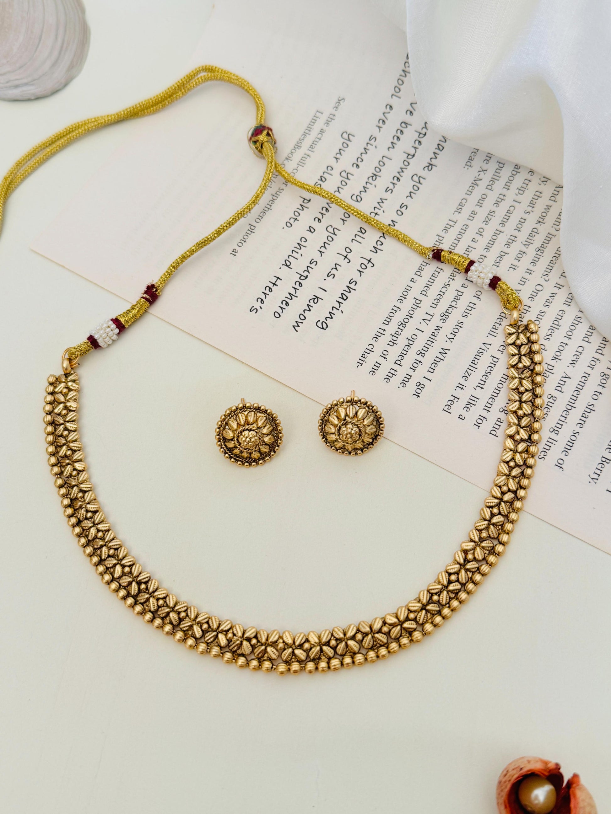 Golden Plated Matt Finish Necklace Set with floral design and matching round earrings by Abdesignsjewellery