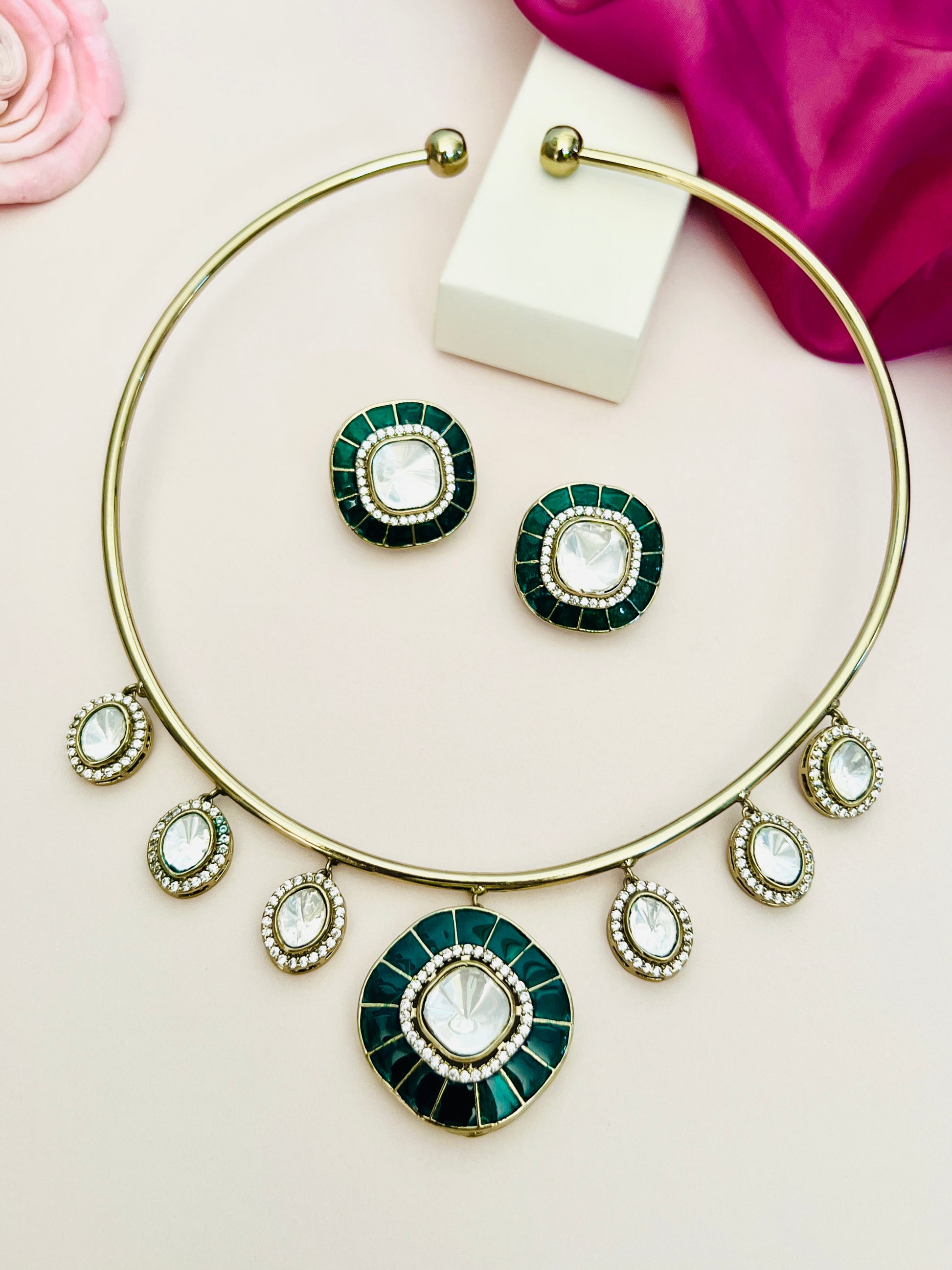 Green Meenakari Polki Hasli Necklace Set with gold tone and matching green and white stone earrings from Abdesignsjewellery