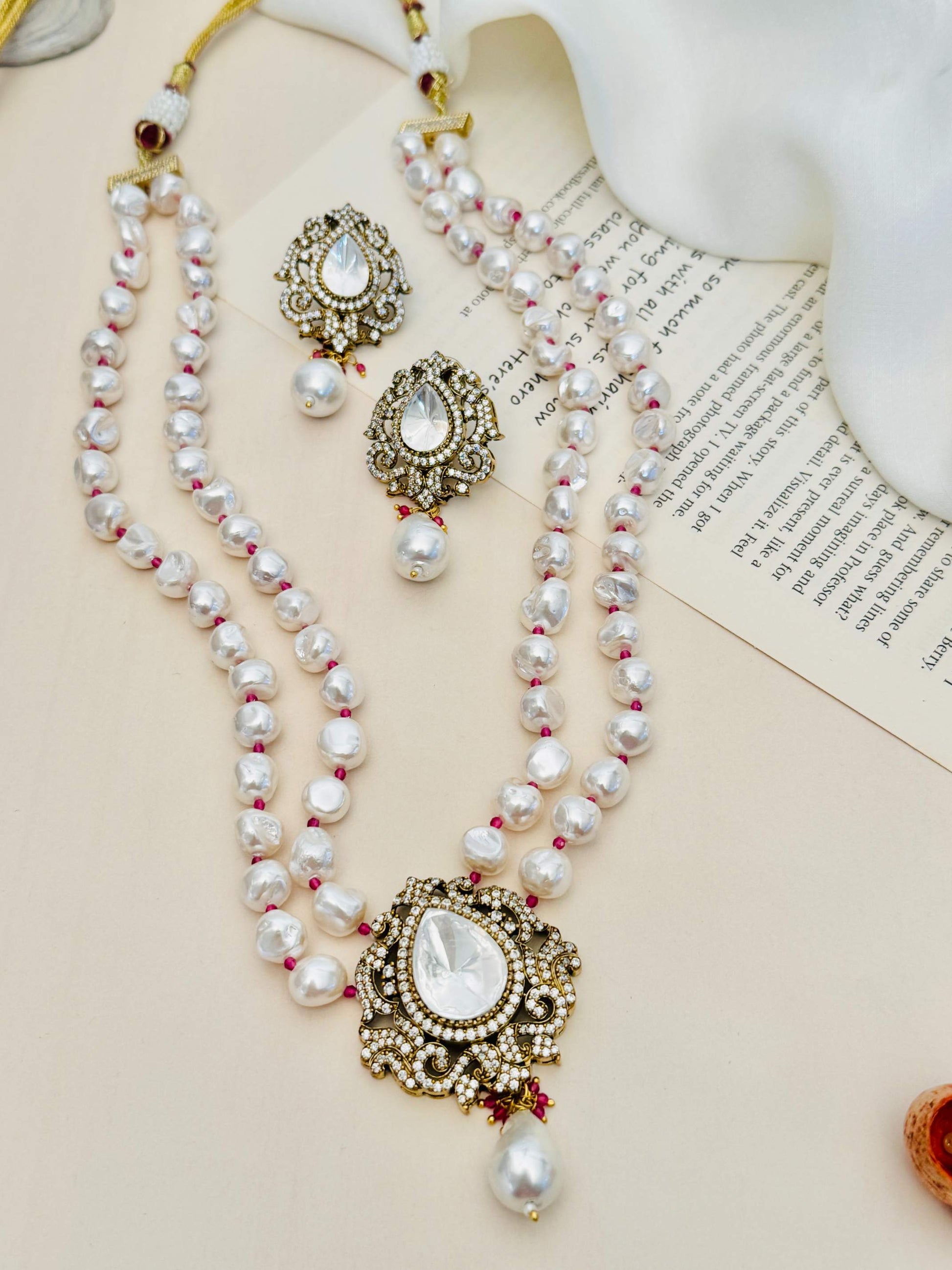 Heritage Fusion Polki Pearl Mala Set with intricate gold detailing and matching earrings