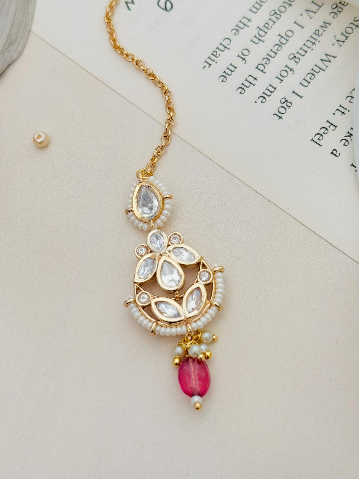 High Quality Bold Gold Plated Kundan Maangtikka with white stones and pink bead from Abdesignsjewellery
