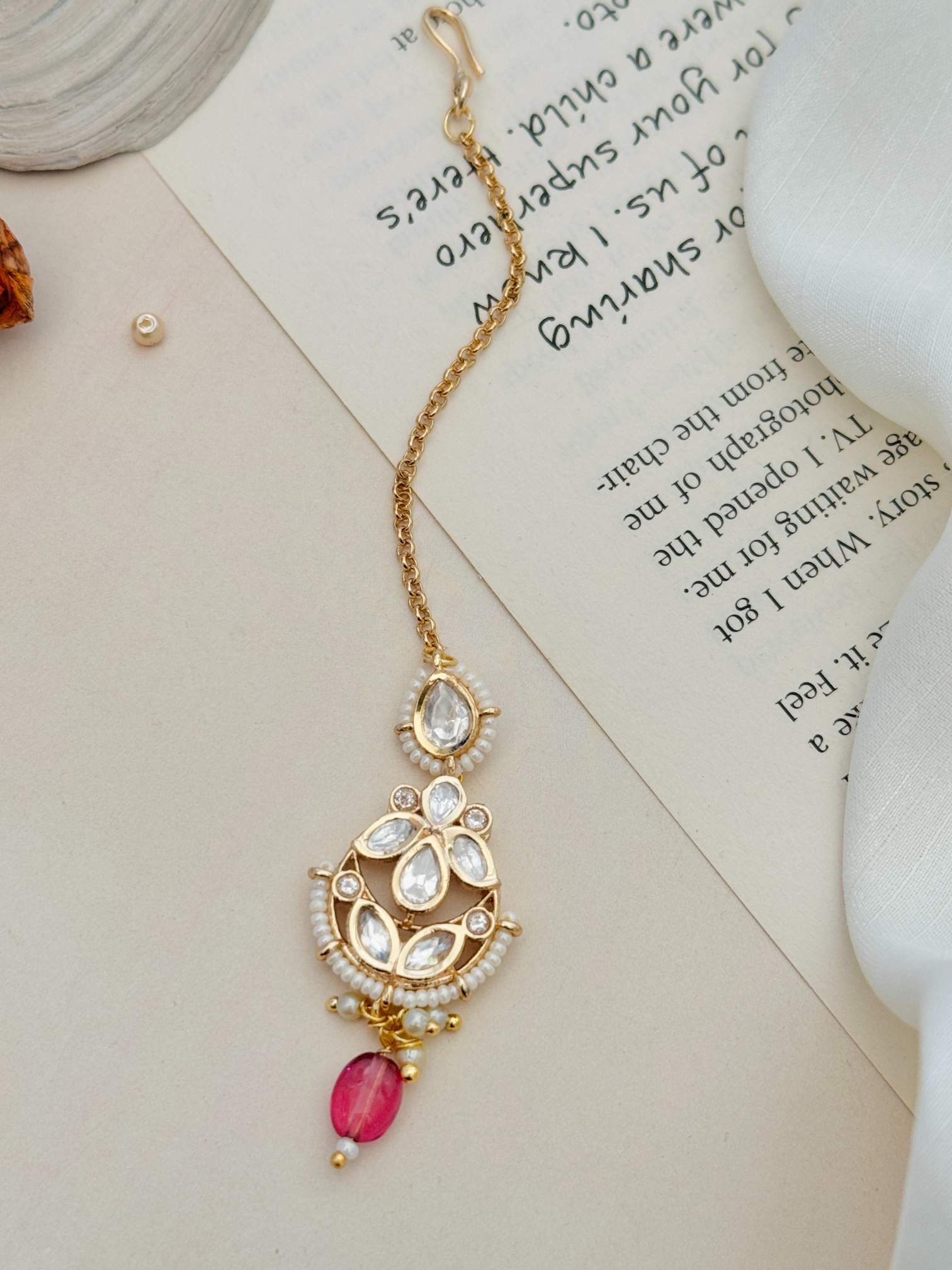 High Quality Bold Gold Plated Kundan Maangtikka with white stones and pink bead by Abdesignsjewellery