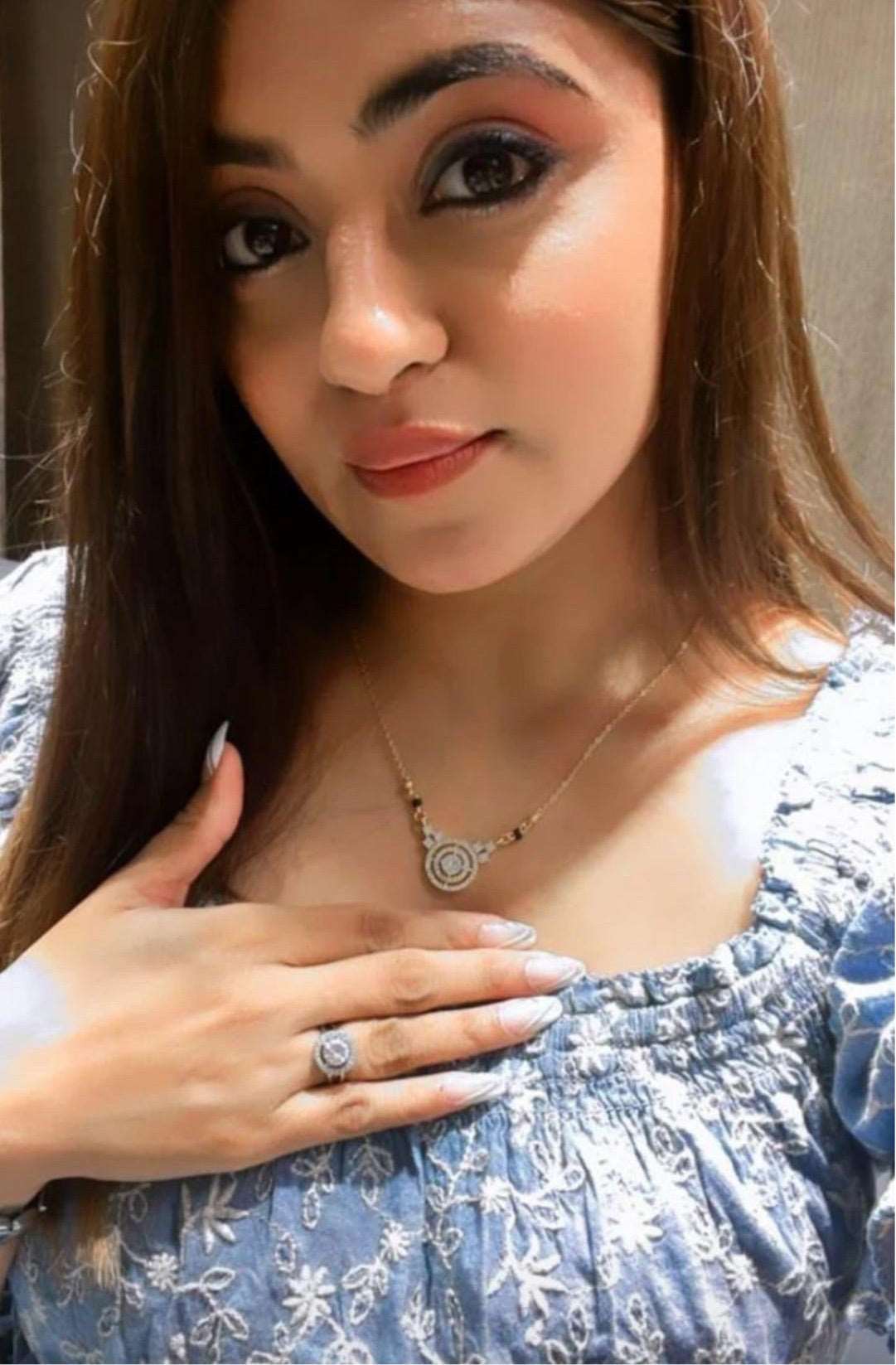 Abdesignsjewellery mangalsutra for daily wear with gold chain and circular pendant worn by woman