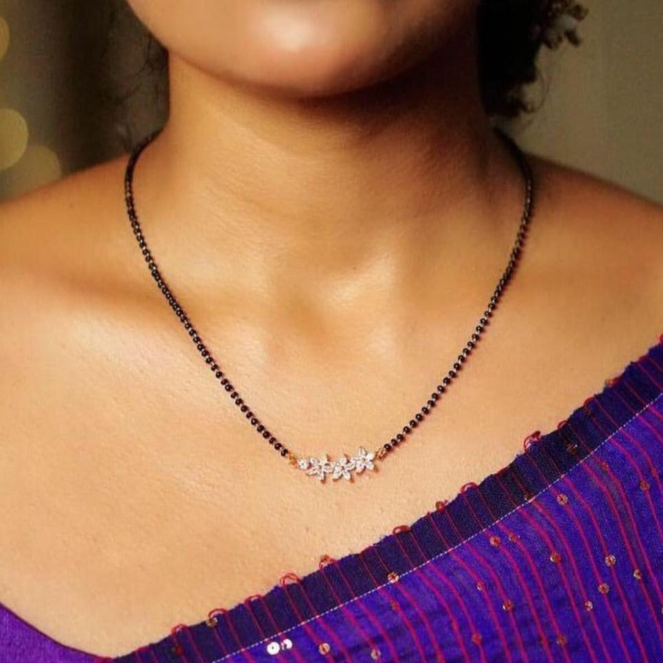 Elegant Mangalsutra for Daily Wear with delicate floral pendant on black bead chain by Abdesignsjewellery