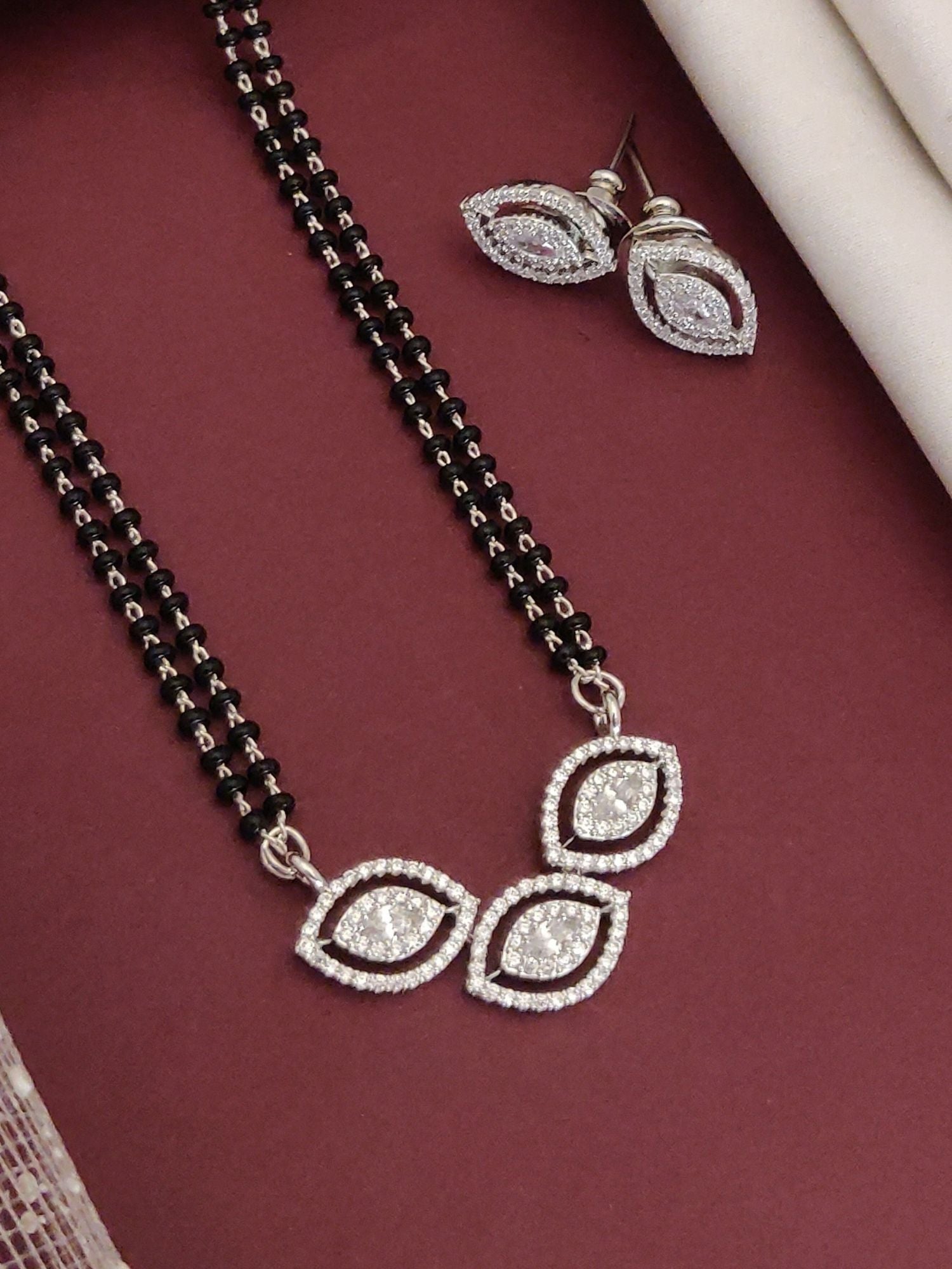 Elegant affordable mangalsutra set with sparkling pendant and matching earrings for traditional wear