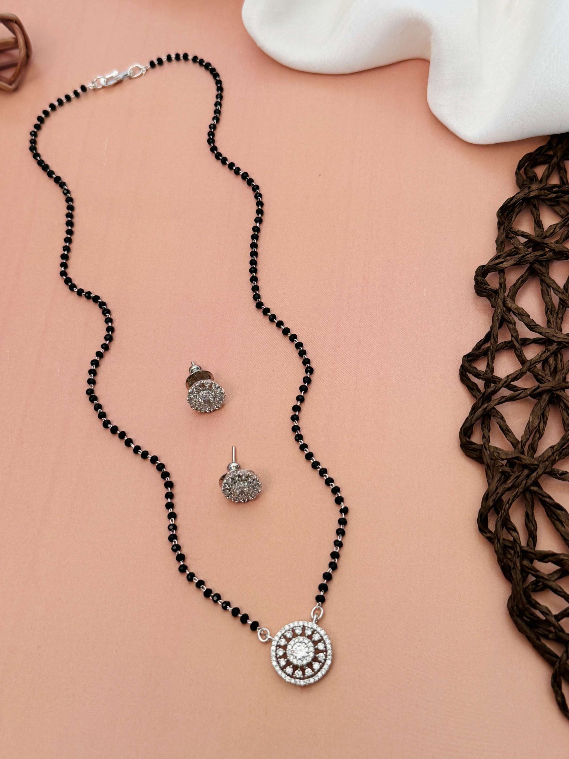 Abdesignsjewellery American Diamond Mangalsutra Set with black beads and matching stud 