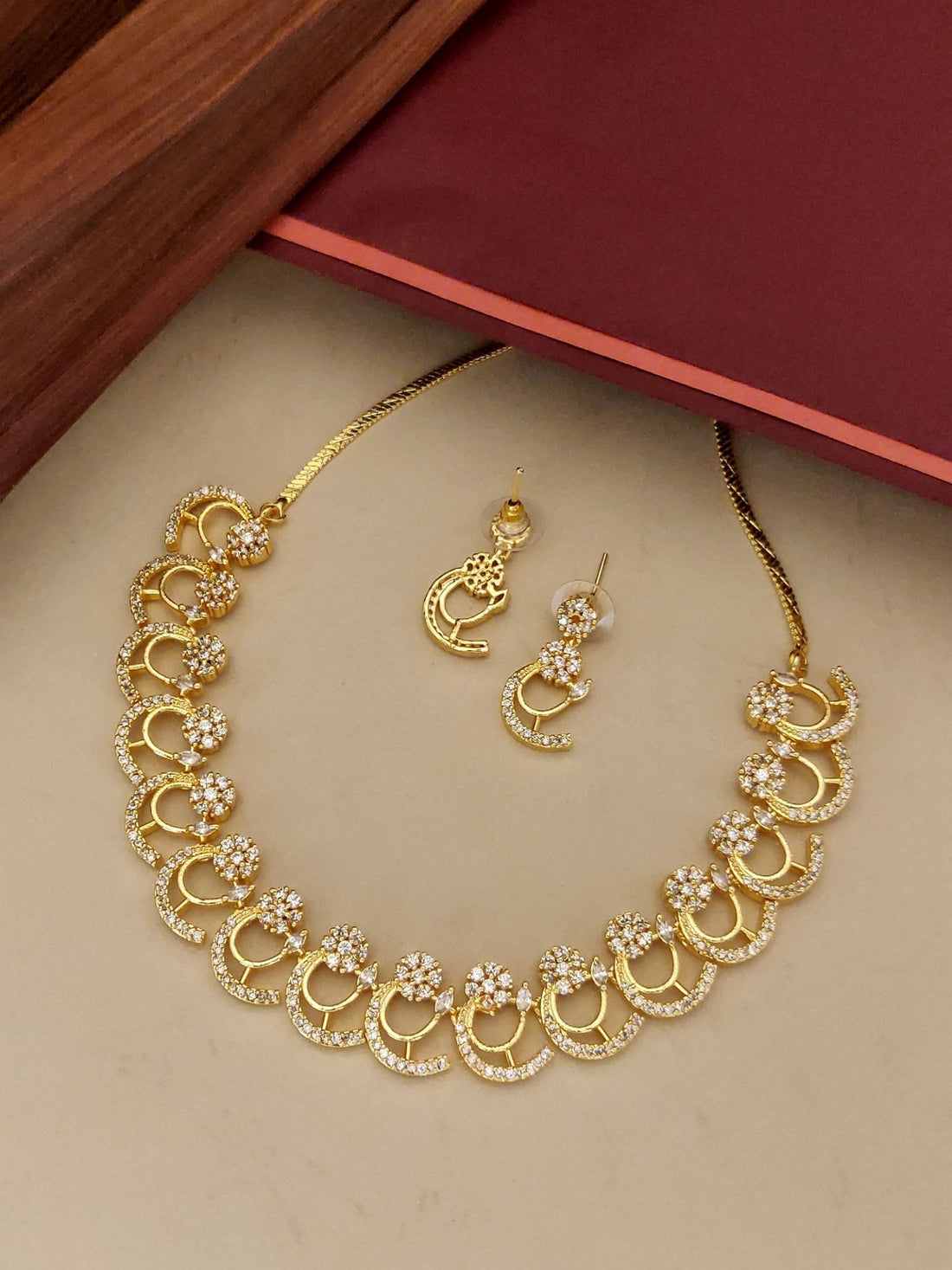 Abdesignsjewellery gold pendant chain with crescent floral motifs and matching drop earrings American diamond necklace set