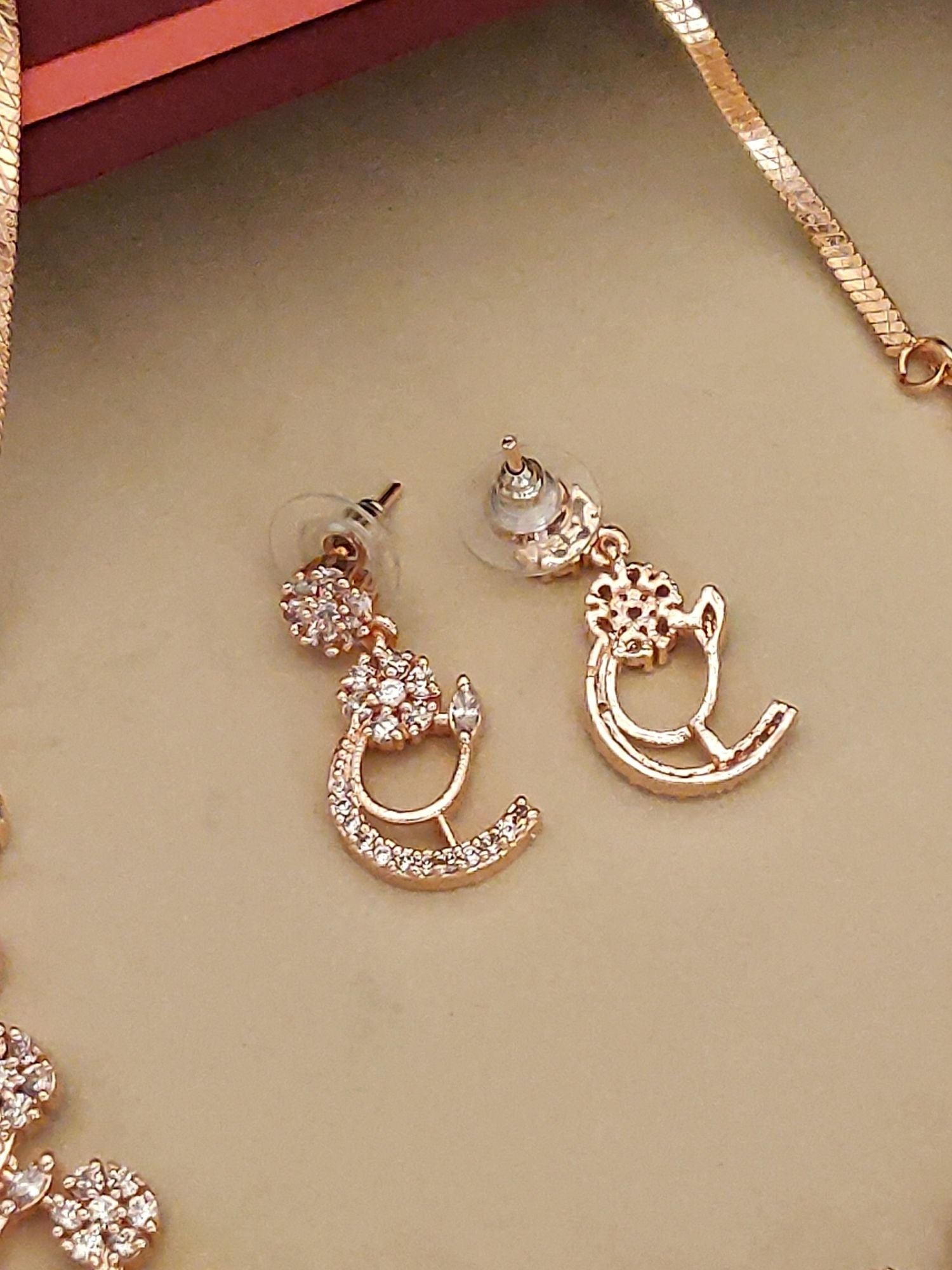 Abdesignsjewellery gold crescent pendant earrings with clustered stones and matching chain American diamond necklace set