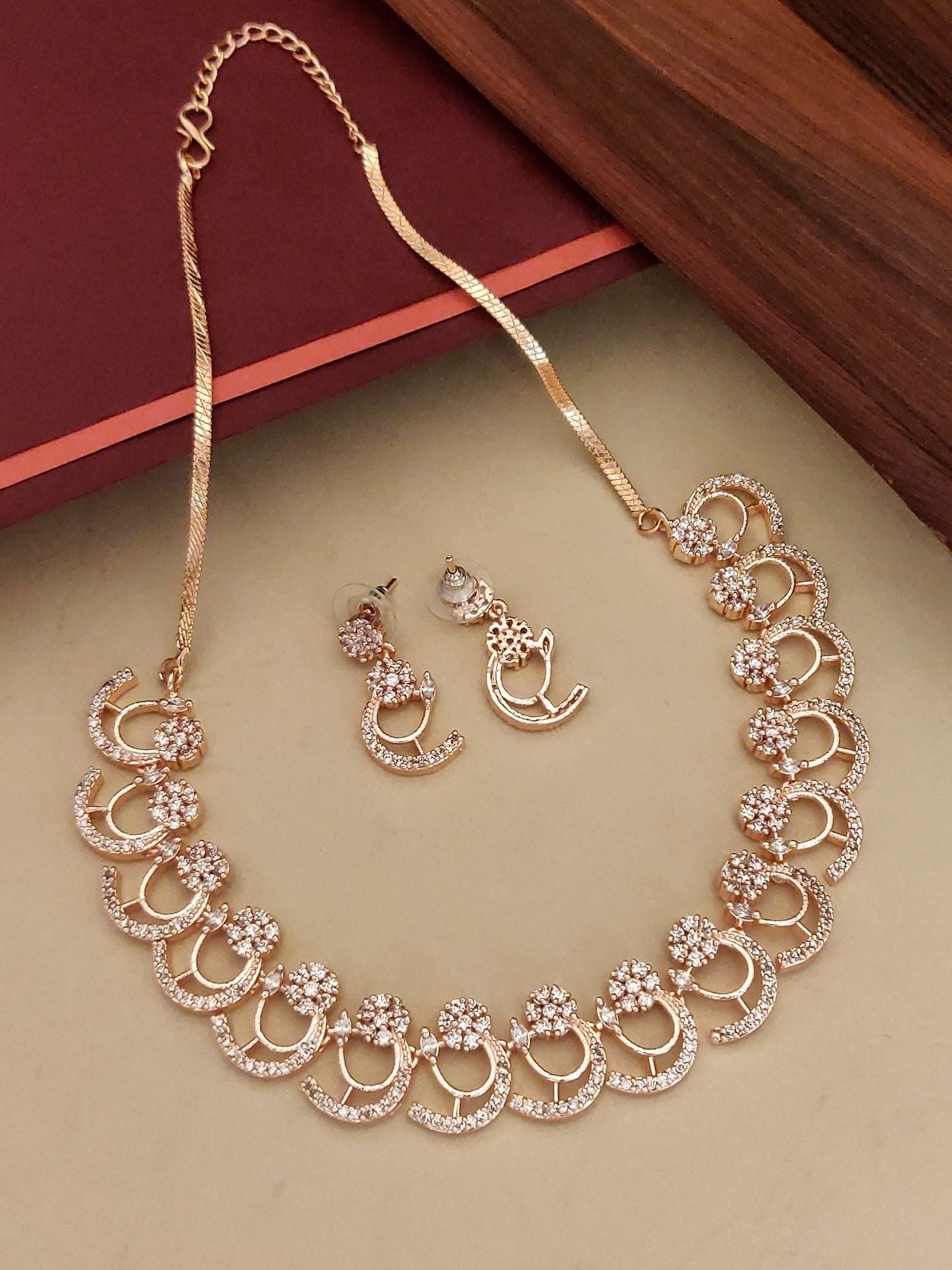Abdesignsjewellery gold tone American diamond necklace set with floral clusters and matching earrings