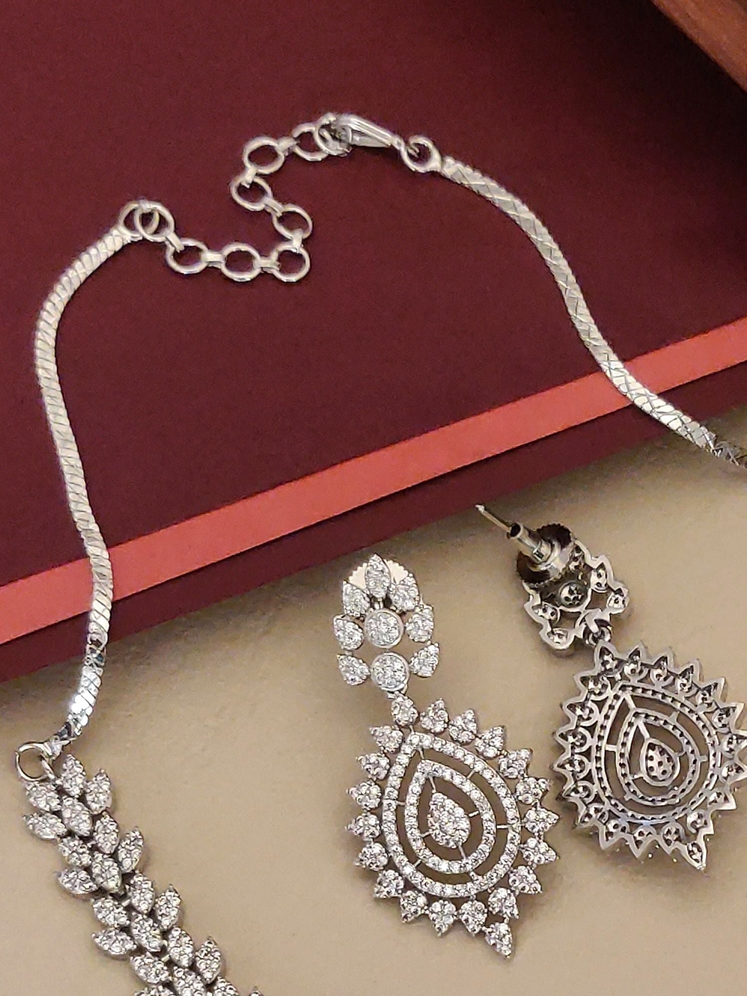 Elegant American Diamond Necklace Set with intricate design and matching earrings for special occasions