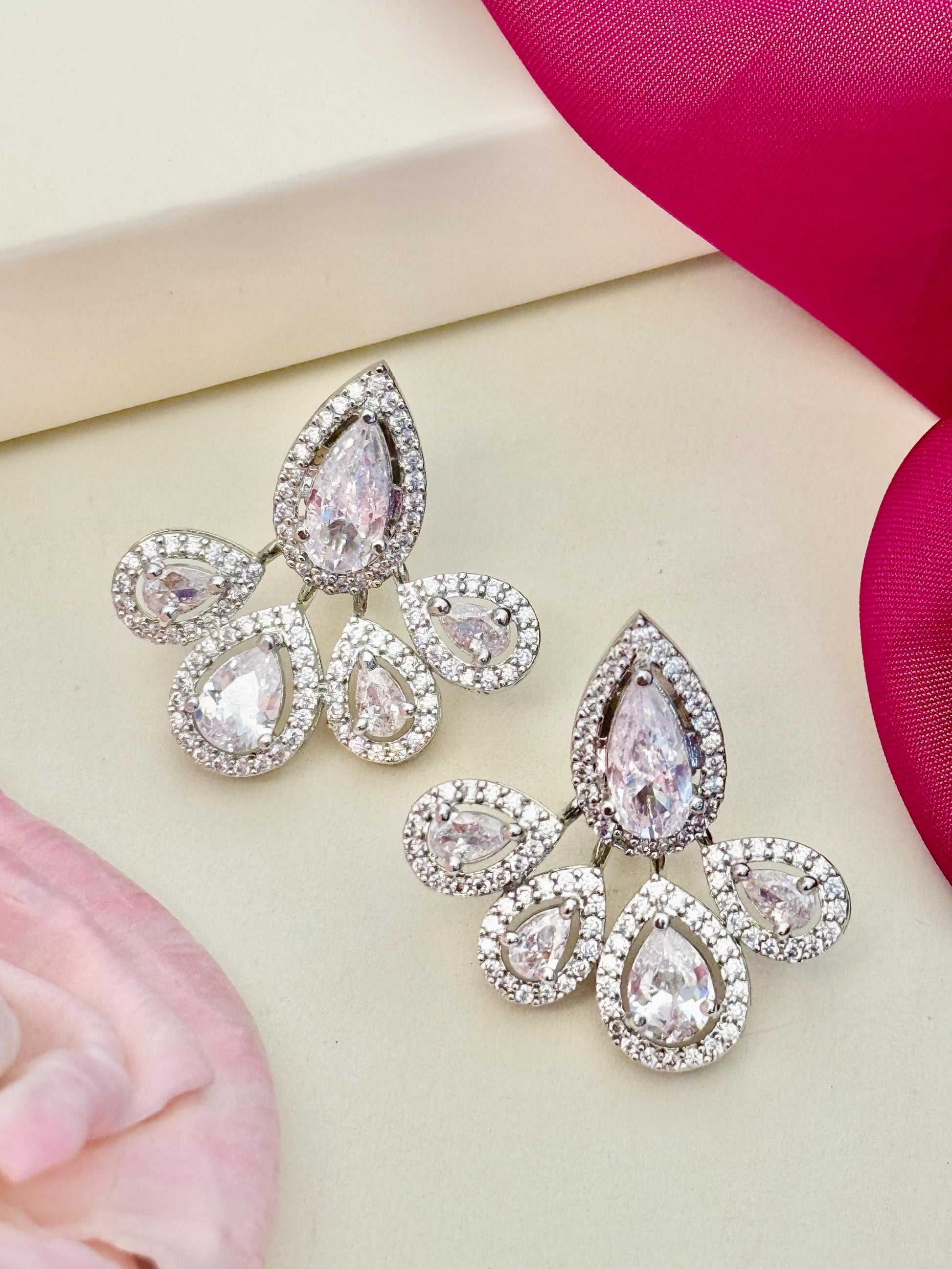 Abdesignsjewellery American Diamond Silver Plated Earring with pear shaped crystals and intricate design