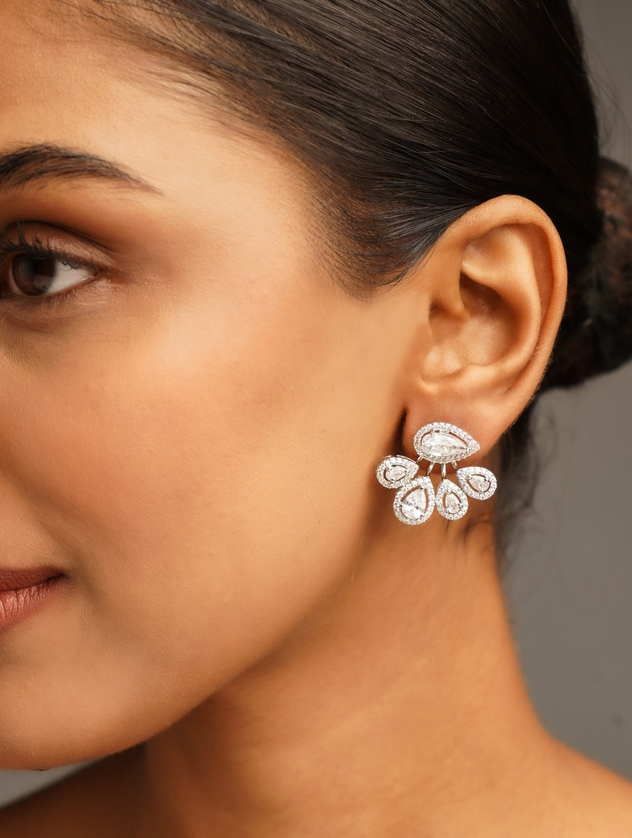 Close-up of woman wearing American Diamond Silver Plated Earring by Abdesignsjewellery with intricate teardrop design