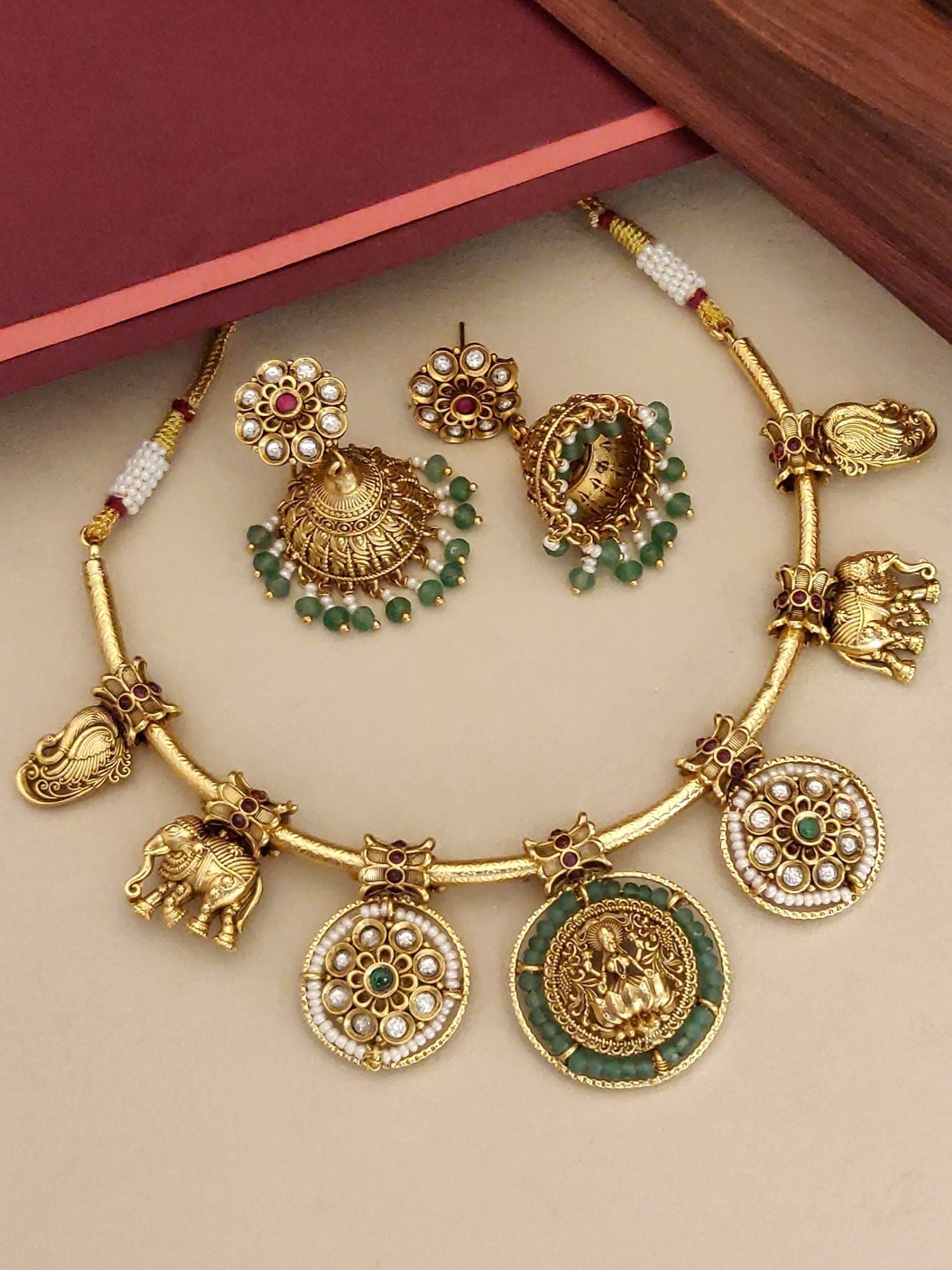 Antique Emerald Green Temple Hasli Neckl with gold finish and intricate green and pearl accents by Abdesignsjewellery