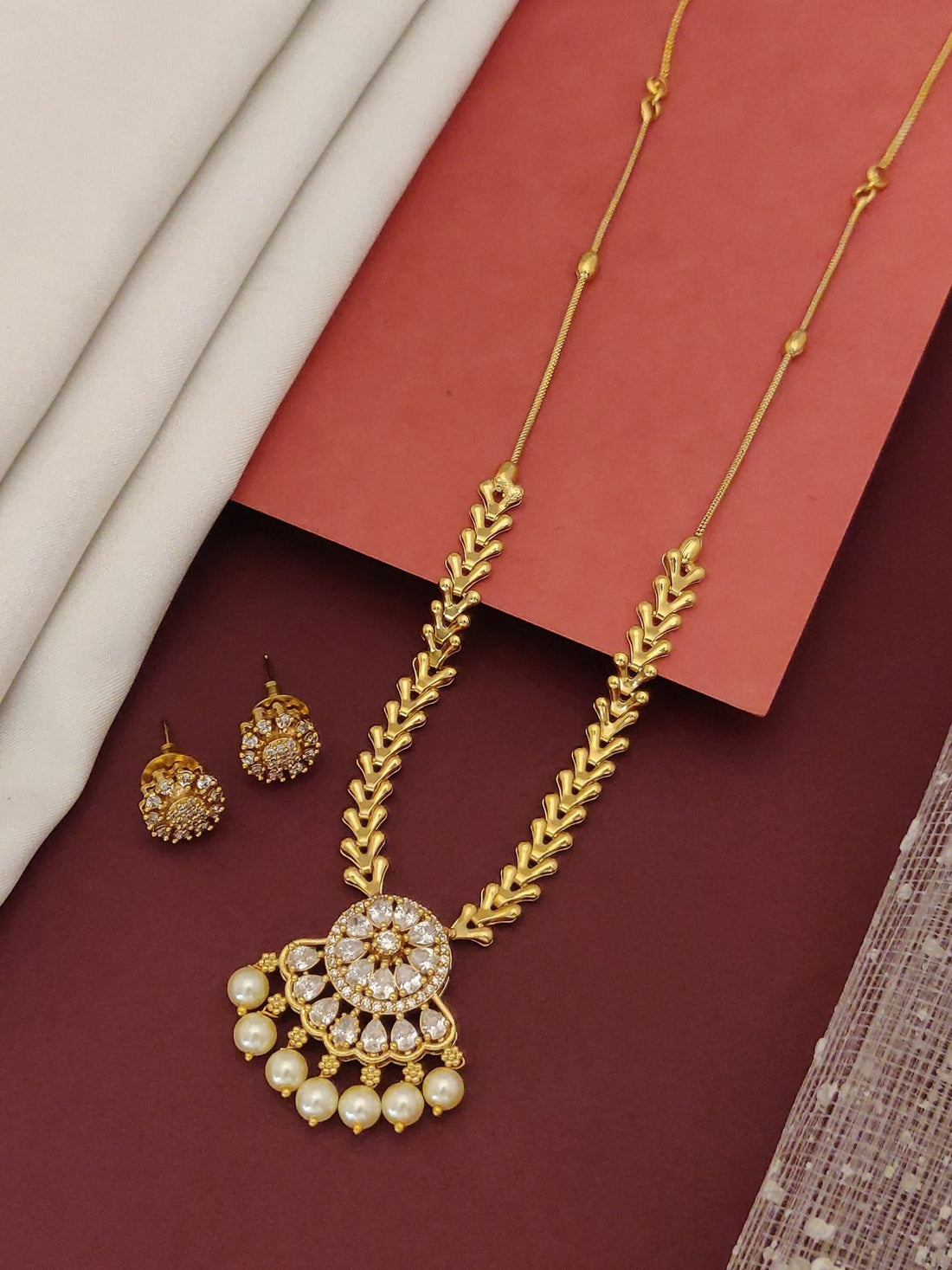 Antique Gold Plated American Diamond Pearl Necklace Set by Abdesignsjewellery with pendant and matching earrings