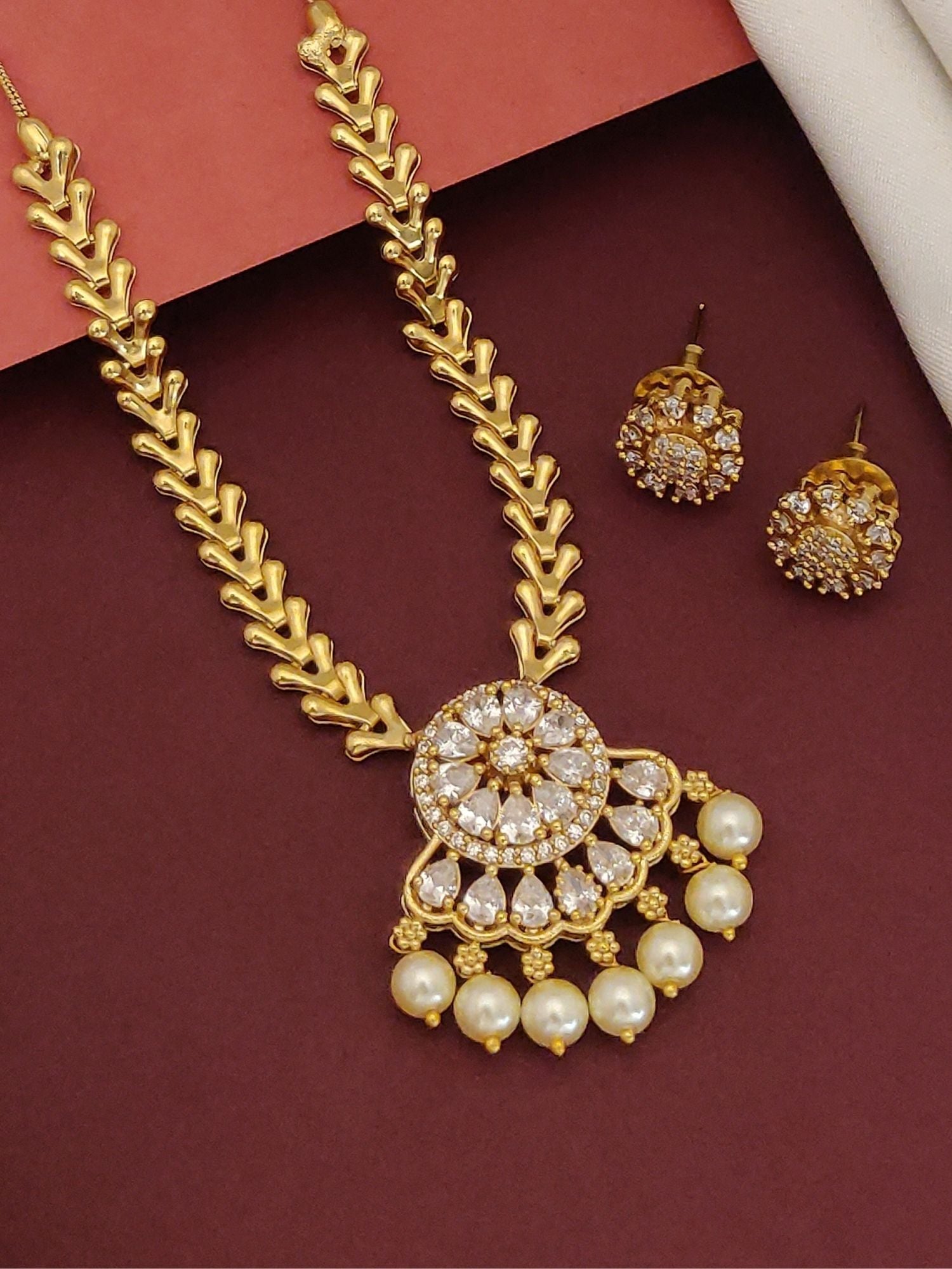 Abdesignsjewellery Antique Gold Plated American Diamond Pearl Necklace Set with floral pendant and matching earrings