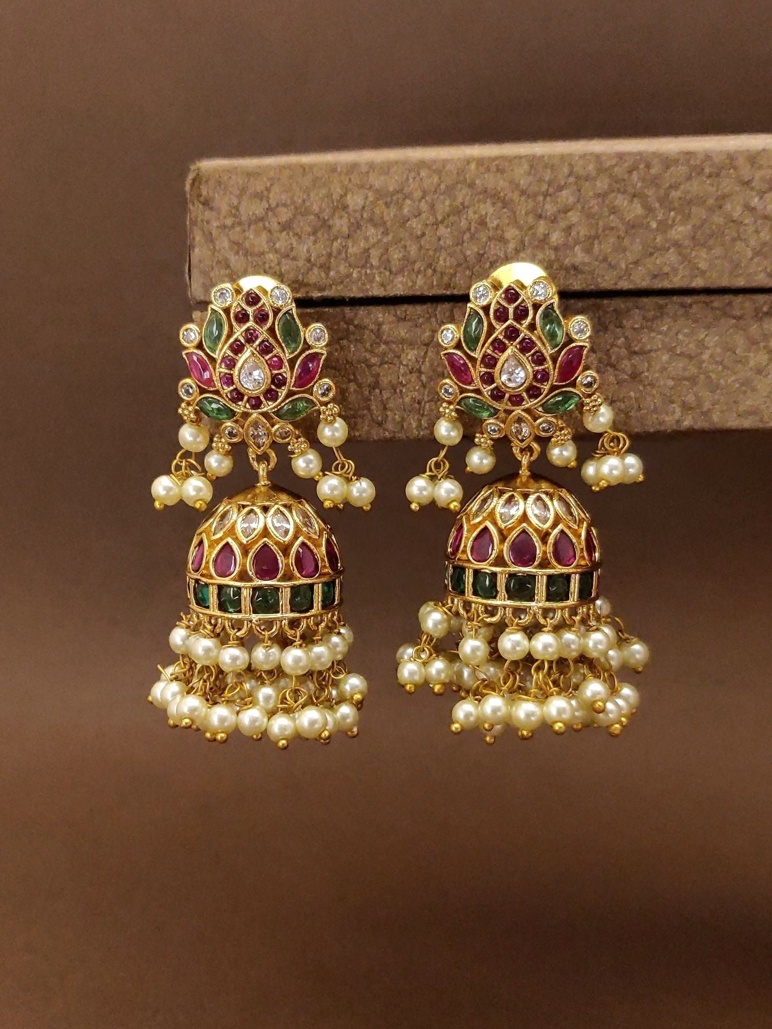 Exquisite Antique Gold Plated Jhumka Earrings with Colorful Stones and Pearl Detailing