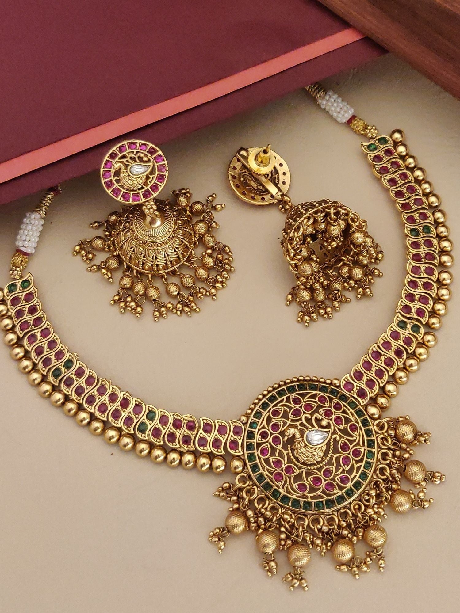Antique Gold Plated KempStone Necklace with intricate design and matching earrings for elegant occasions