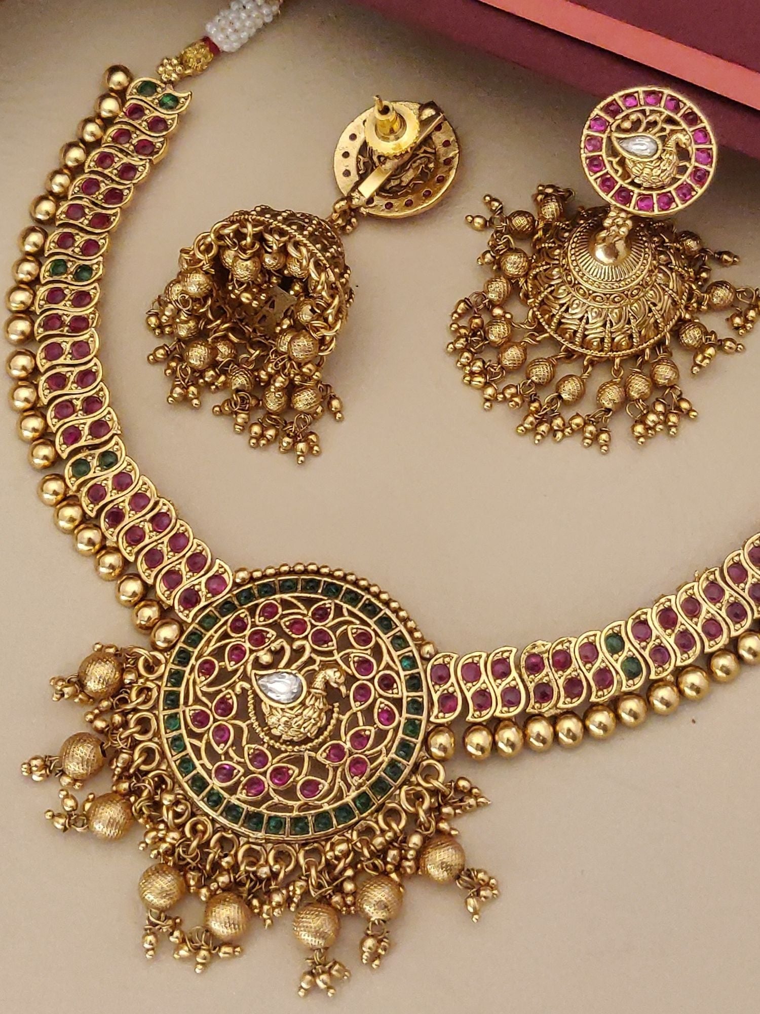 Antique Gold Plated KempStone Necklace set with earrings featuring intricate design and colorful stones