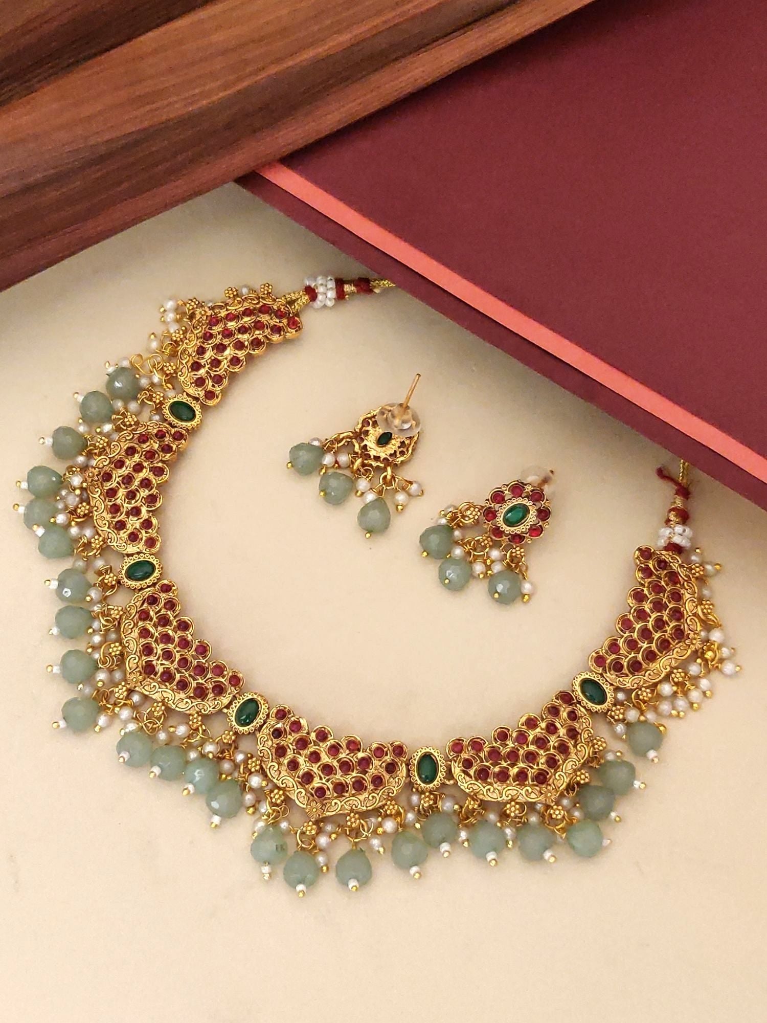 Antique Gold Plated KempStone Studed Necklace Set with matching earrings and intricate design