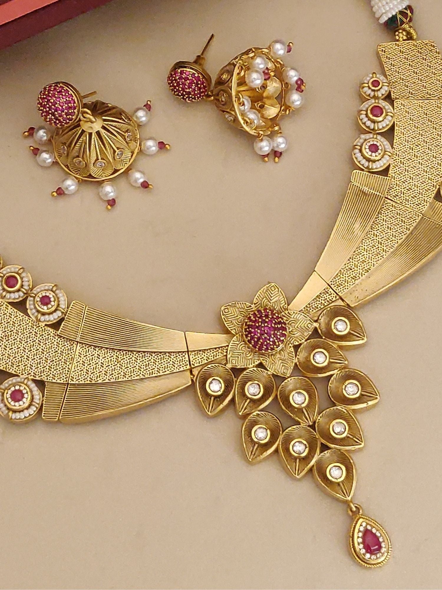 Antique Gold Plated Necklace Set with intricate design and matching earrings for elegant occasions