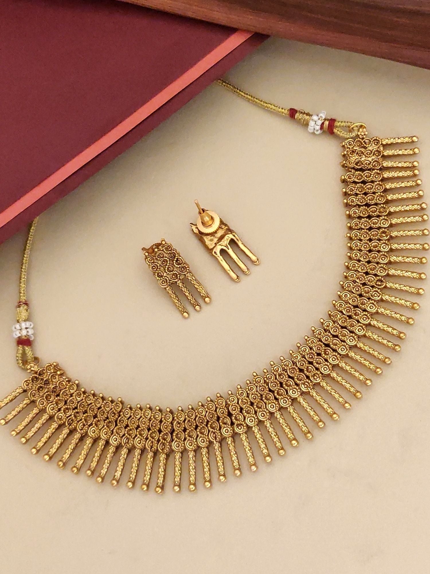 Antique Gold Plated Necklace Set featuring intricate design and matching earrings for elegant occasions