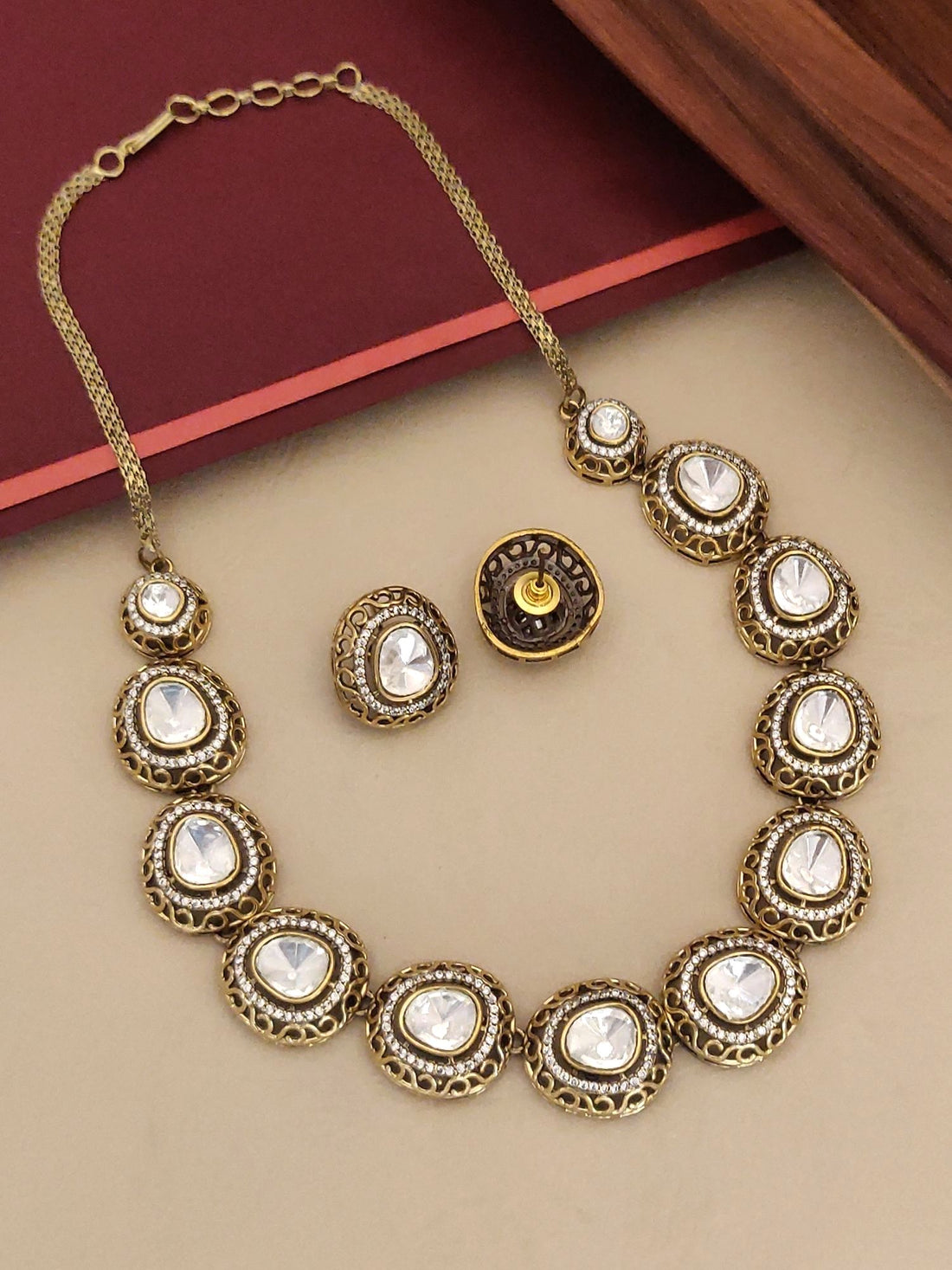 Antique Gold Plated Polki Necklace Set with intricate design and sparkling stones for elegant occasions