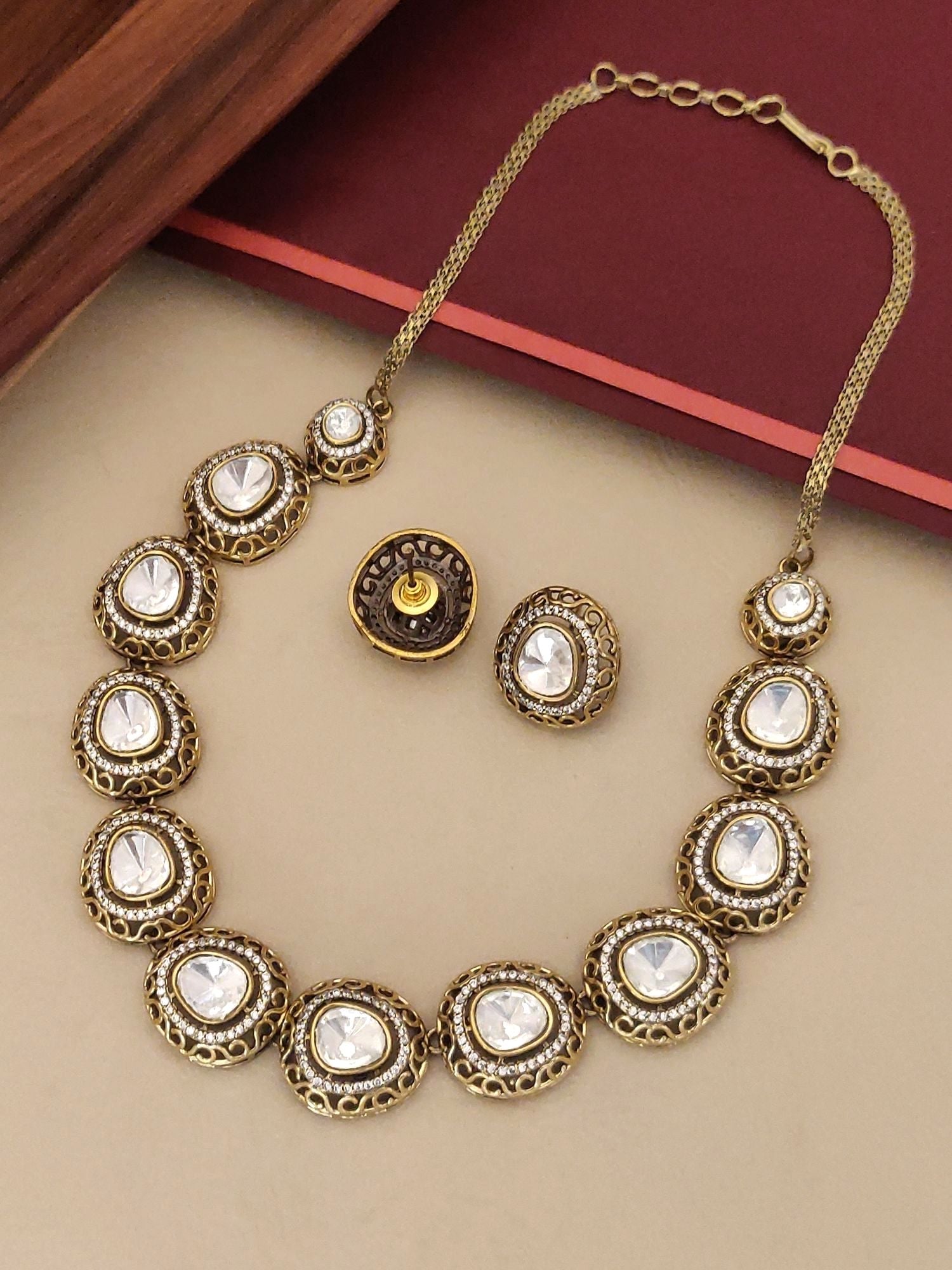 Antique Gold Plated Polki Necklace Set featuring intricate design and matching earrings
