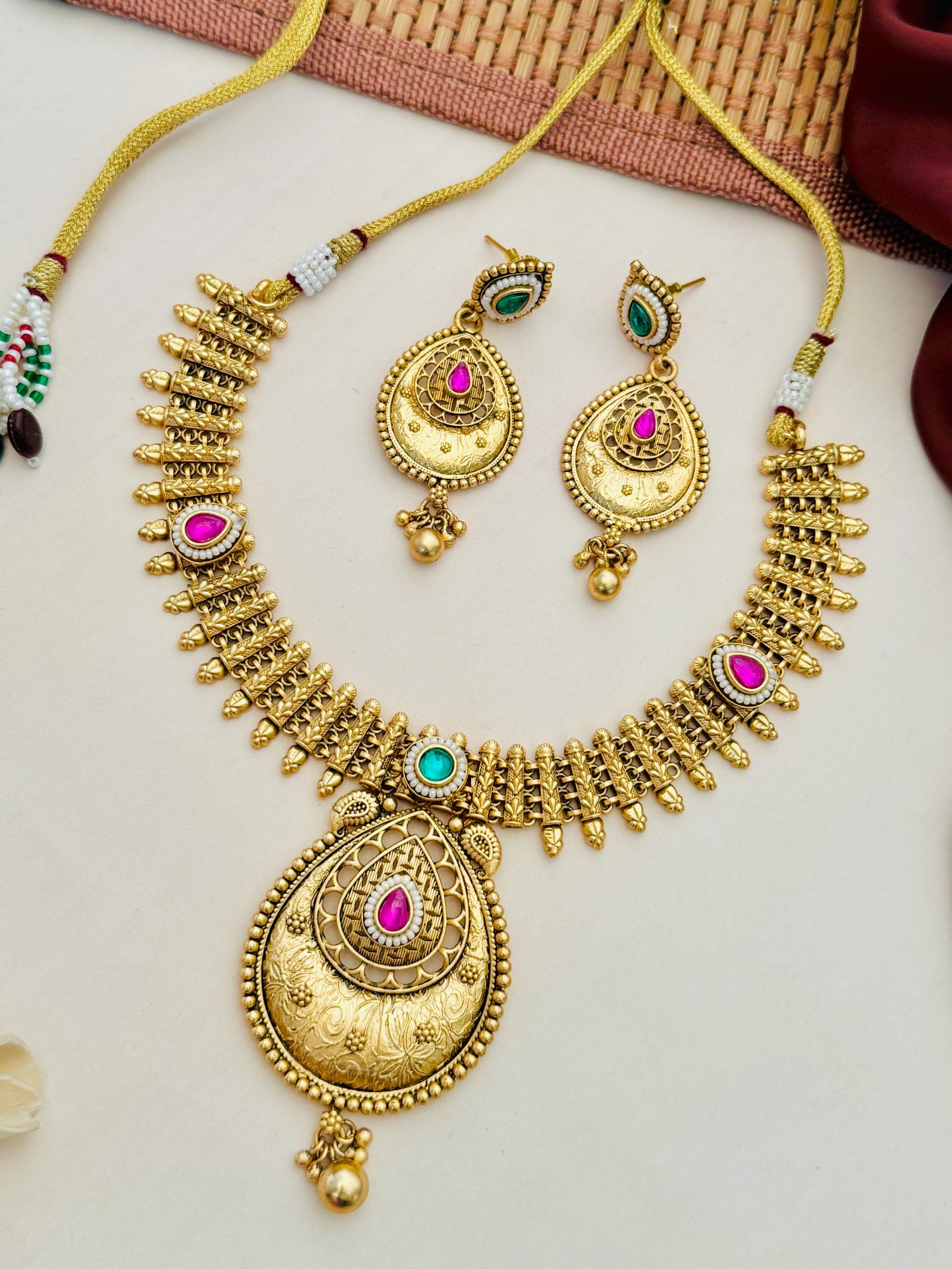 Antique Golden Plated Matt Finish Necklace Set with intricate traditional design and matching earrings