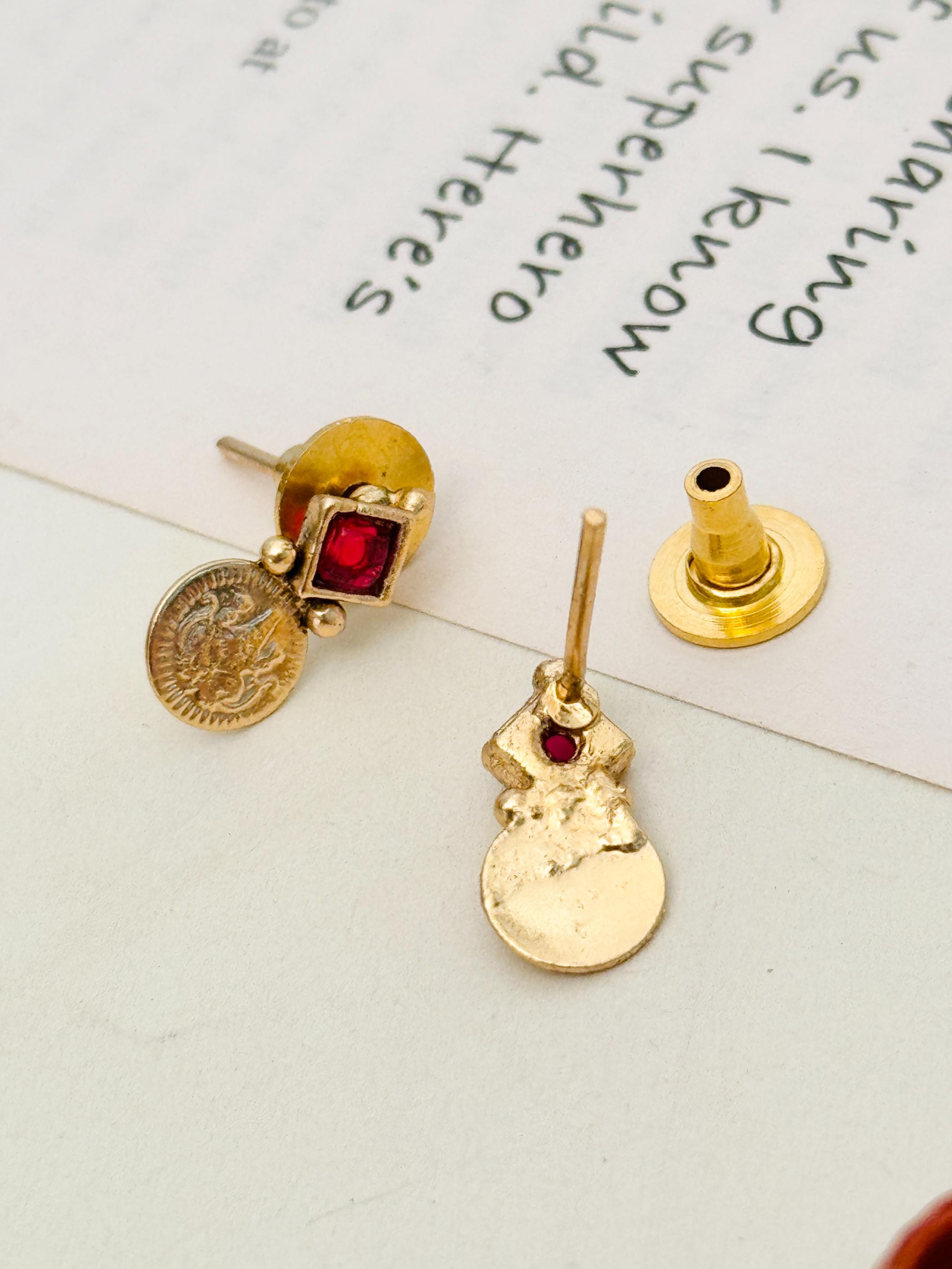 Antique Golden Plated Matt Finish Necklace Set stud earrings with intricate design and red gemstone accents by Abdesignsjewellery