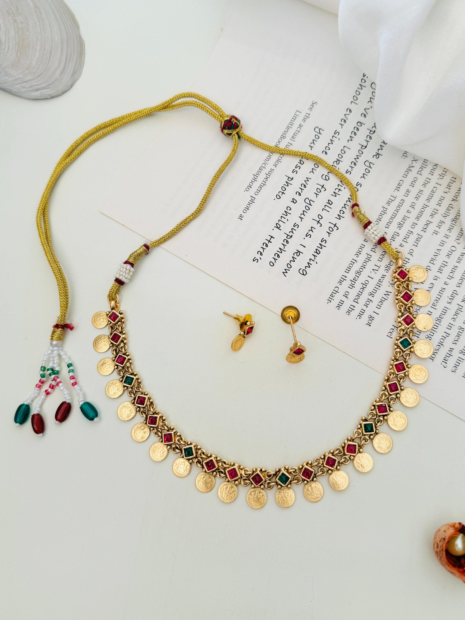 Abdesignsjewellery Antique Golden Plated Matt Finish Necklace Set with intricate coins and red green stones