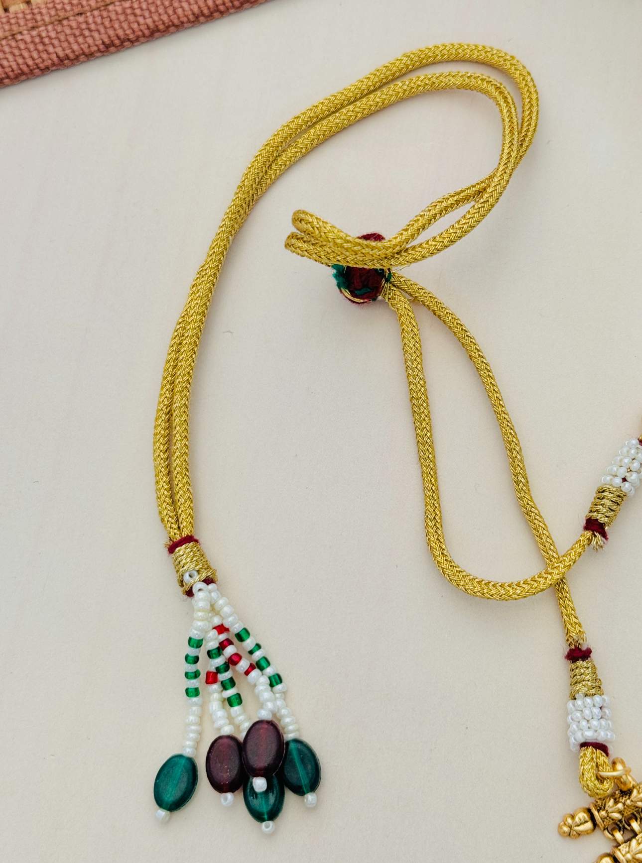 Antique Golden Plated Matt Finish Necklace Set with green and red bead details by Abdesignsjewellery