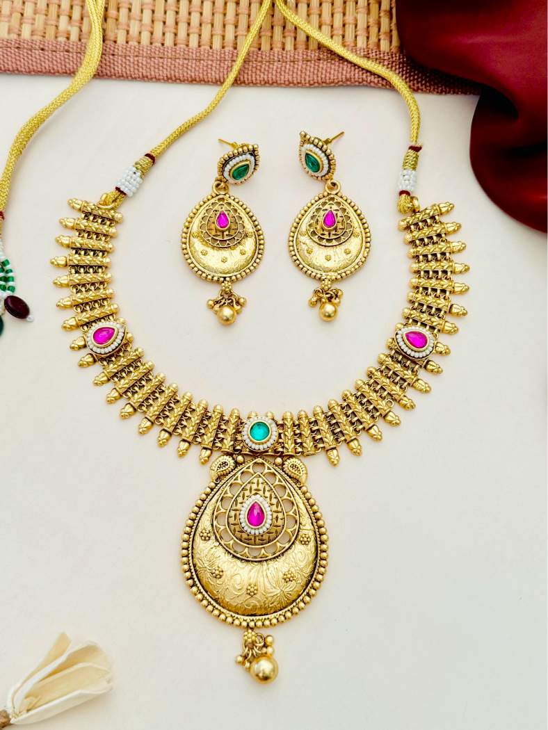Antique Golden Plated Matt Finish Necklace Set with intricate design and matching earrings by Abdesignsjewellery
