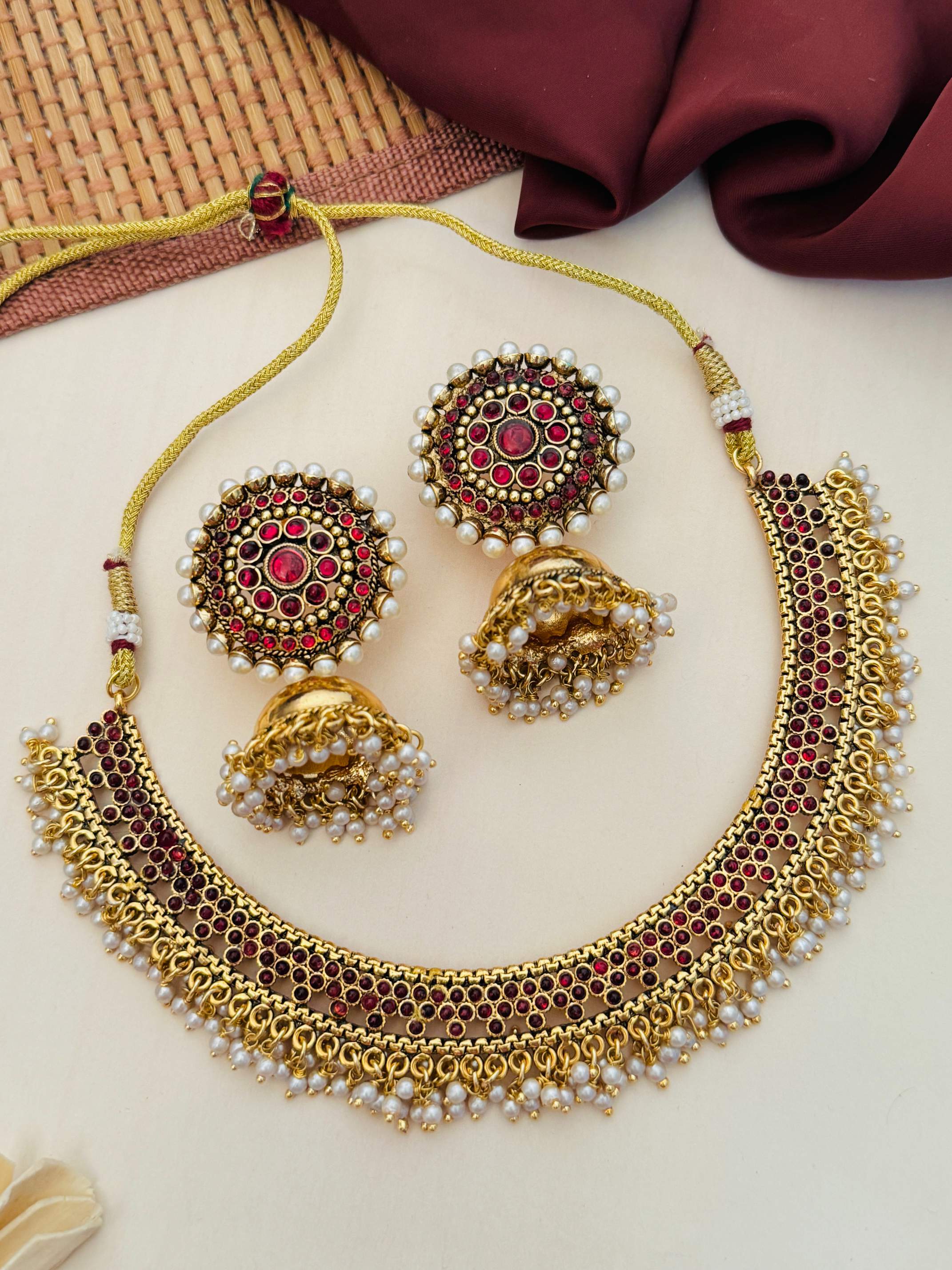 Antique Matt Gold Plated Necklace Set with intricate red and pearl accents by Abdesignsjewellery