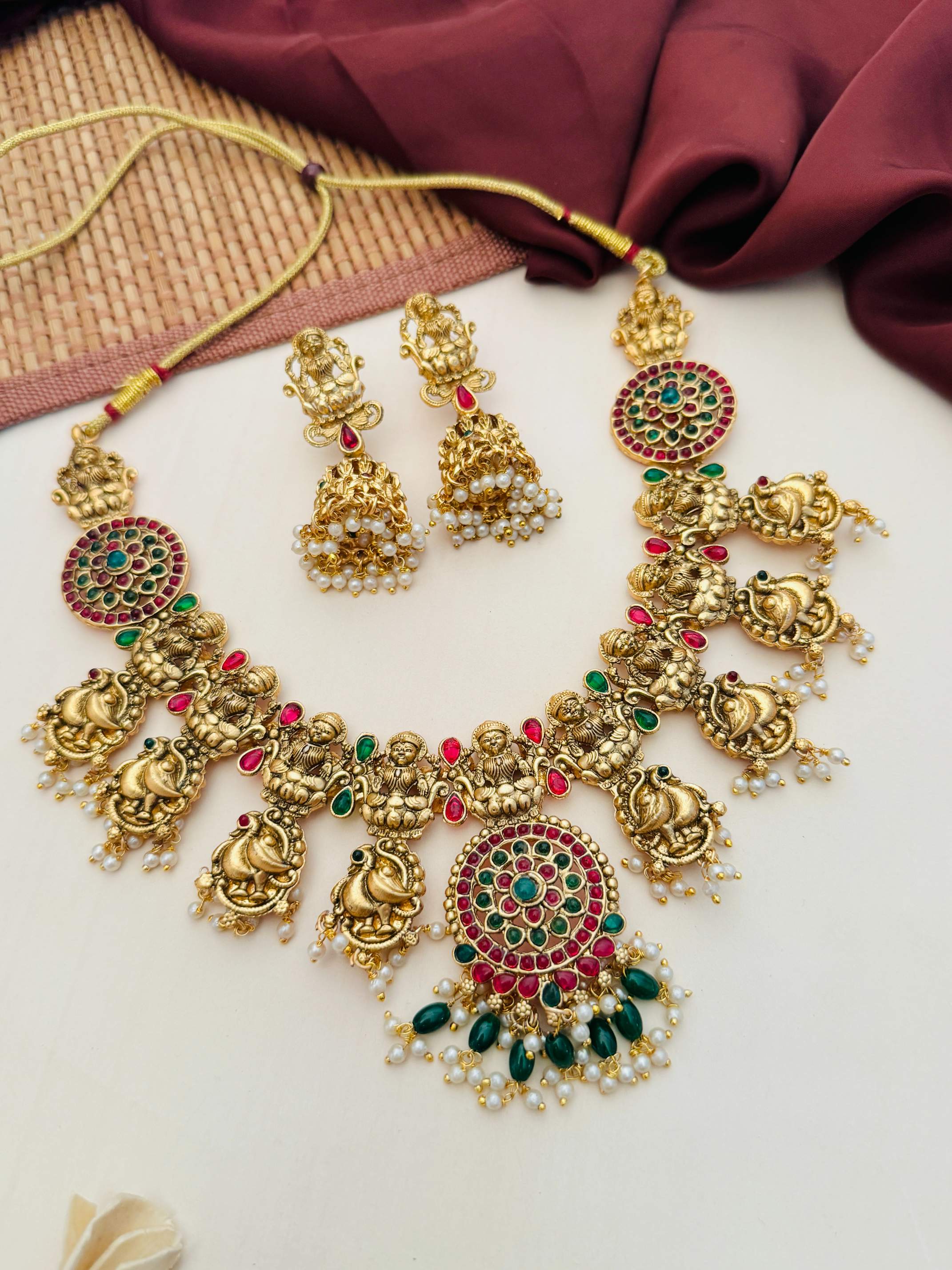 Antique Matt Gold Plated Temple Necklace Set with intricate deity pendants and colorful gemstones by Abdesignsjewellery