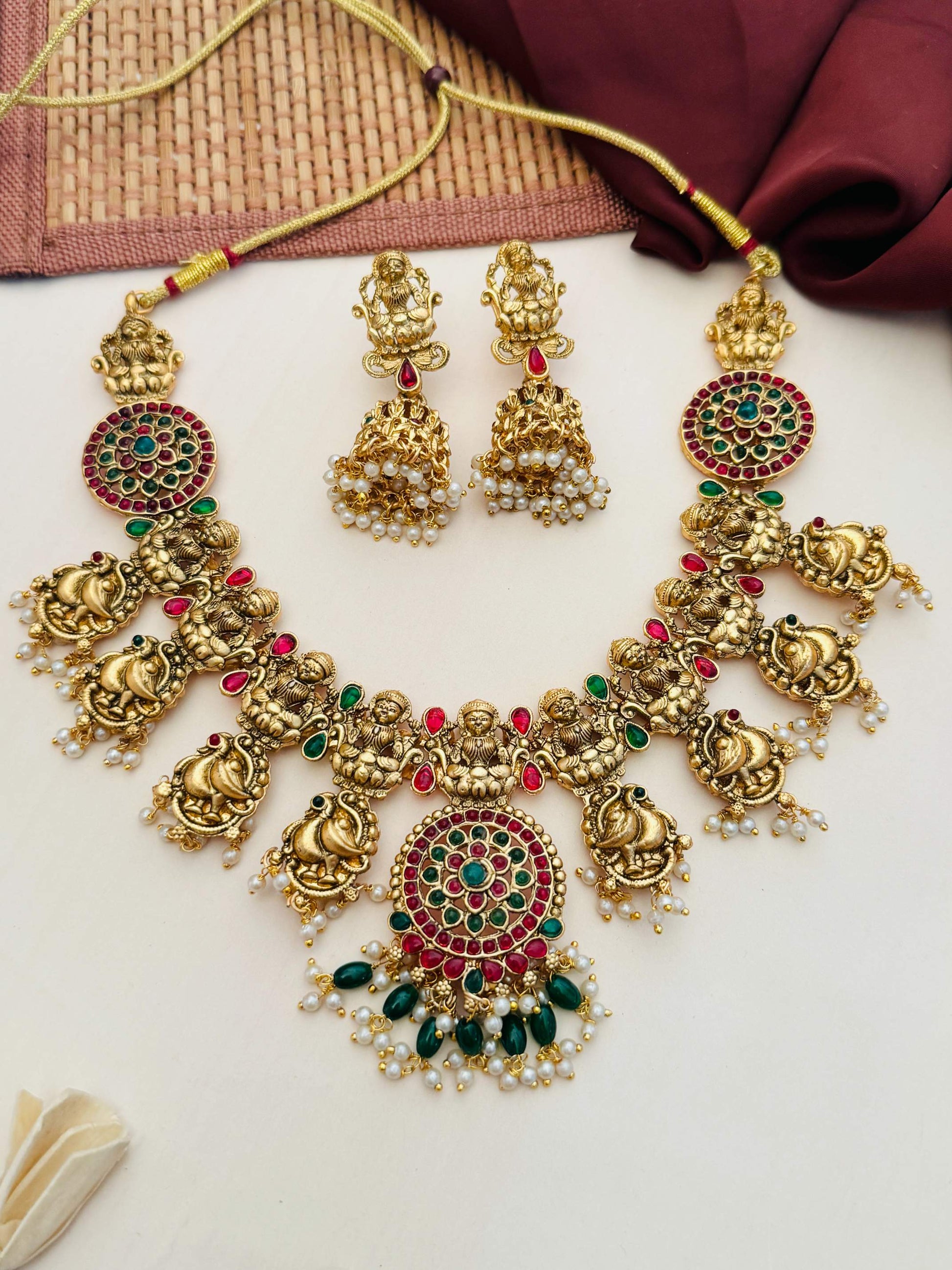Antique Matt Gold Plated Temple Necklace Set with intricate traditional design and matching earrings