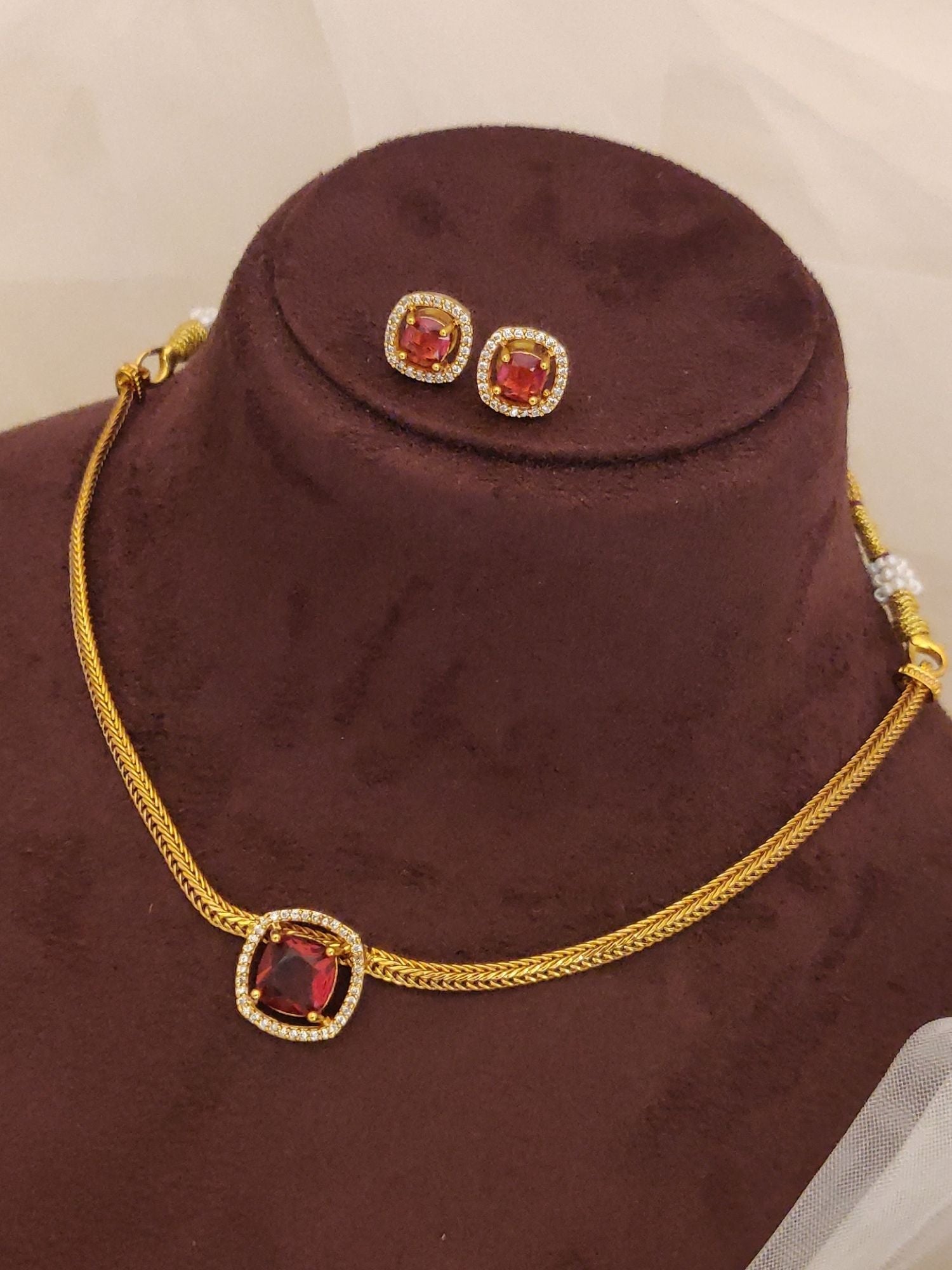 Artificial Emerald Green diamond jewelry set for women pendant chain and matching earrings in gold tone