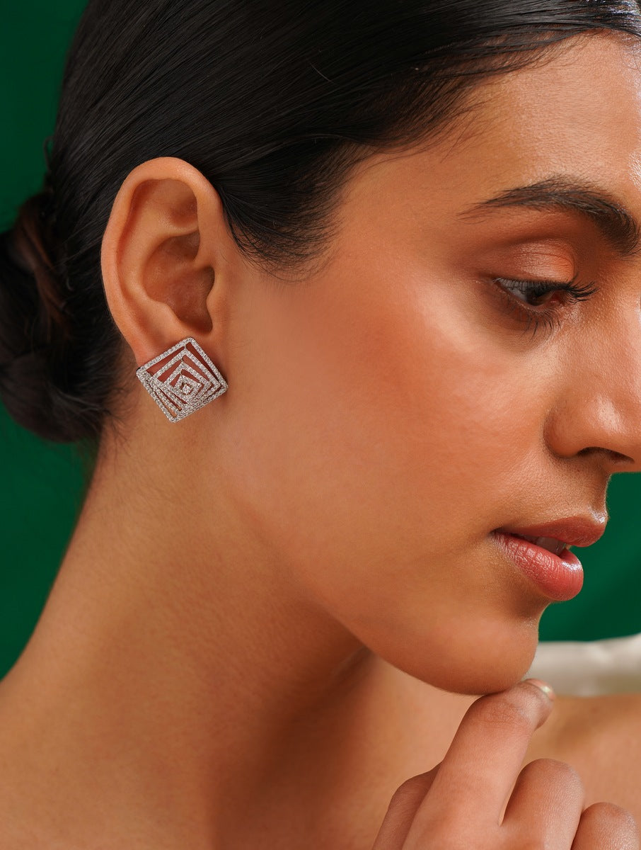 Artistic American Diamond Silver Plated Earring worn by woman showcasing geometric design