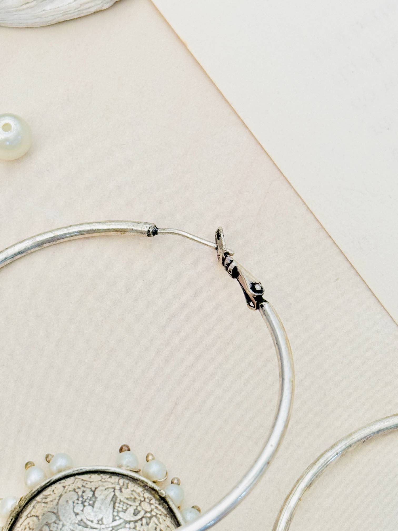 Beautiful German Silver Plated Jhumka Earring by Abdesignsjewellery featuring intricate design with pearl accents