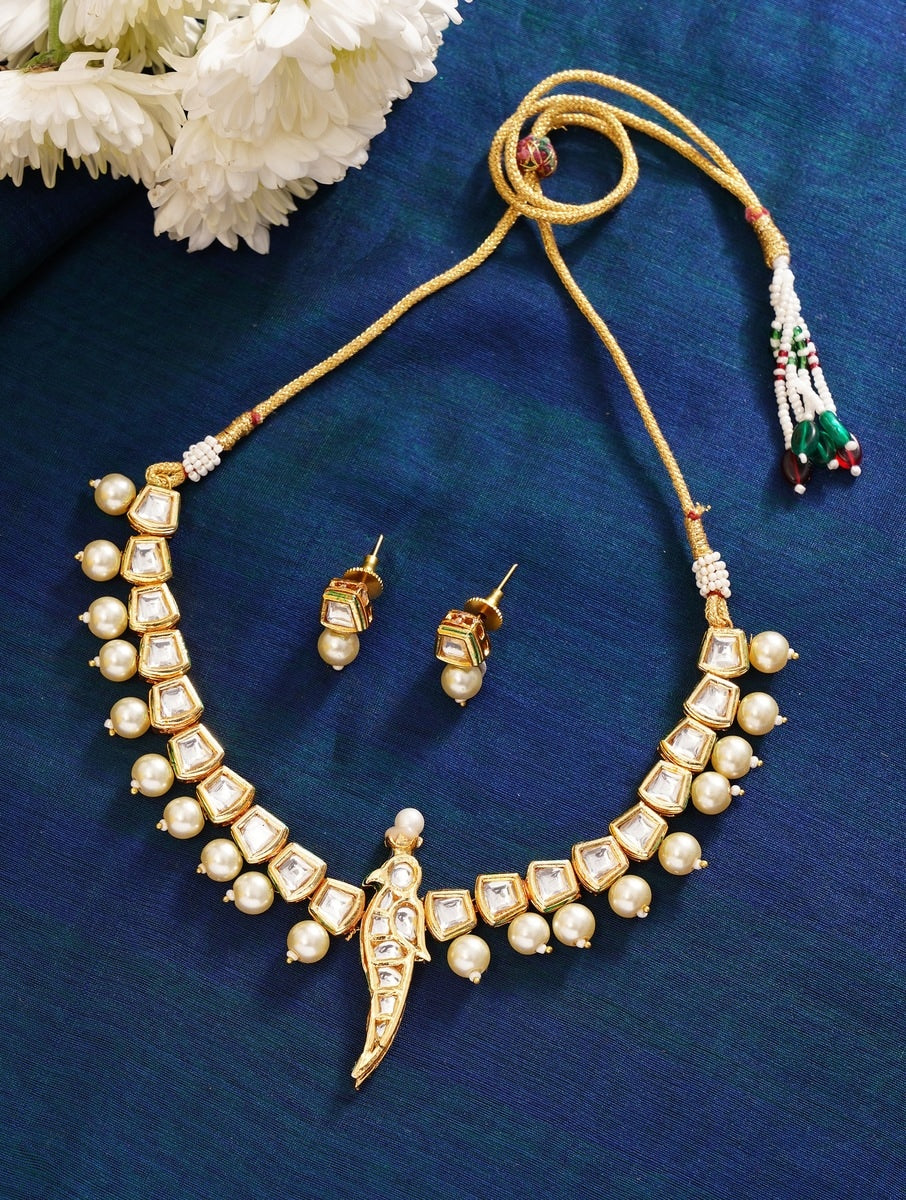 Beautiful Parrot Pearl Kundan Necklace with gold and pearl details worn by a woman