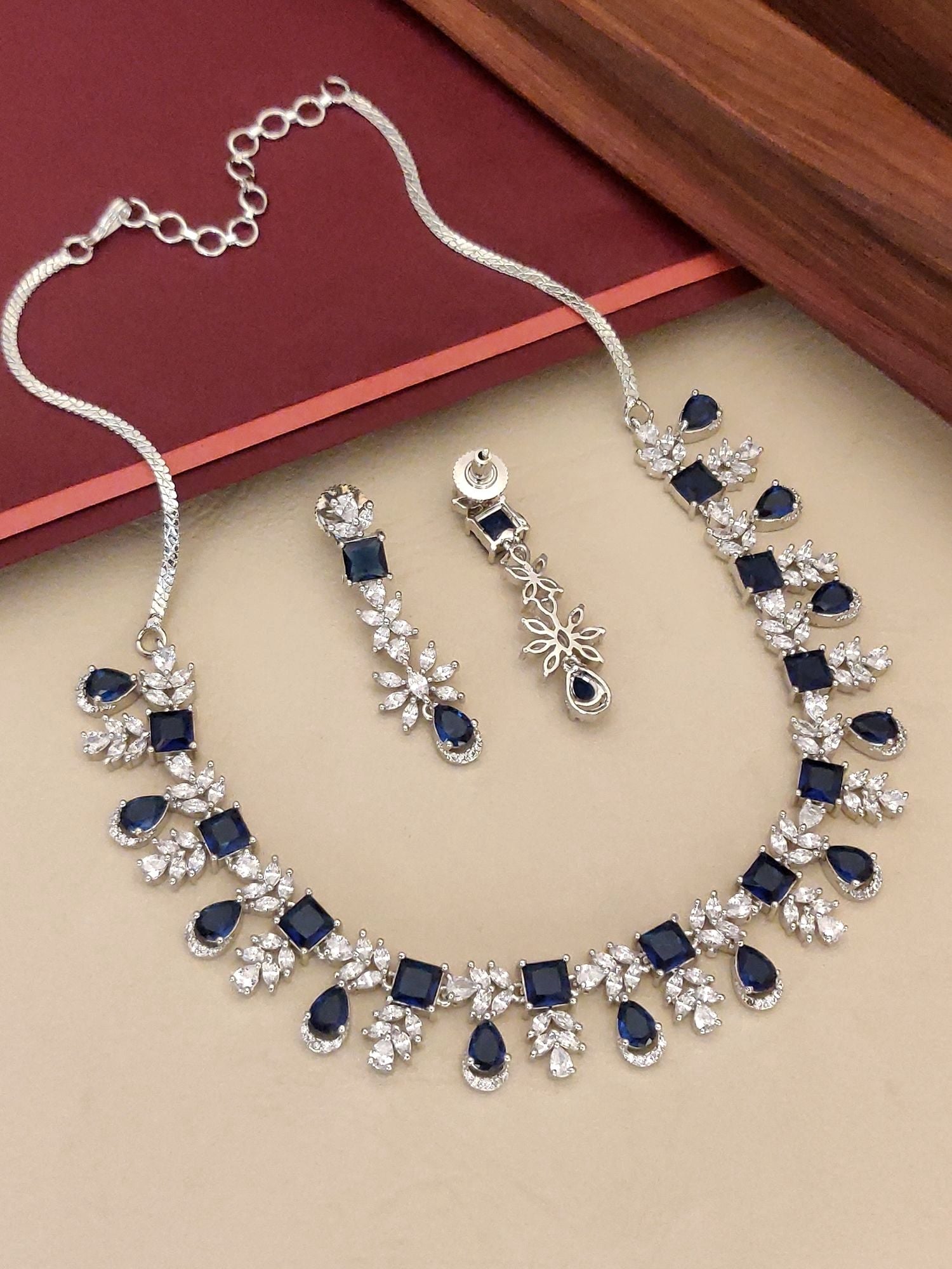 Elegant Blue Sapphire American Diamond Necklace Set with Silver Accents and Matching Earrings