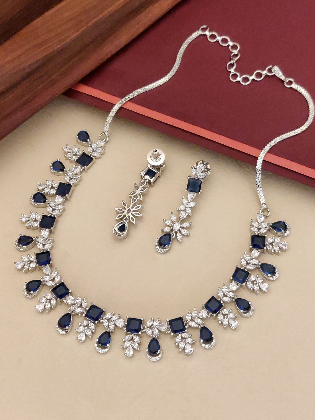 Elegant Blue Sapphire American Diamond Necklace Set with Silver Accents and Matching Earrings