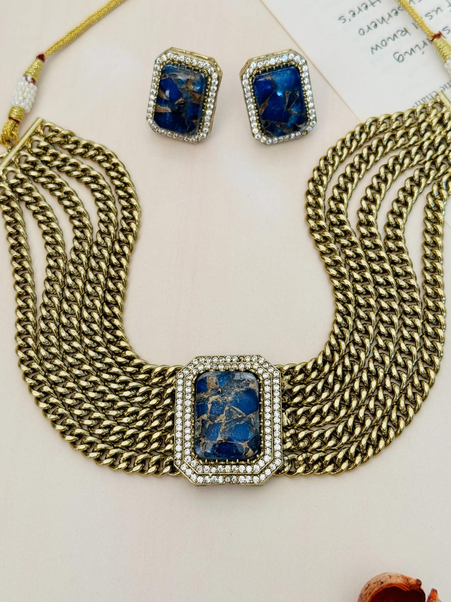 Abdesignsjewellery Chain Choker Necklace Set with multiple gold chains and blue gemstone centerpiece